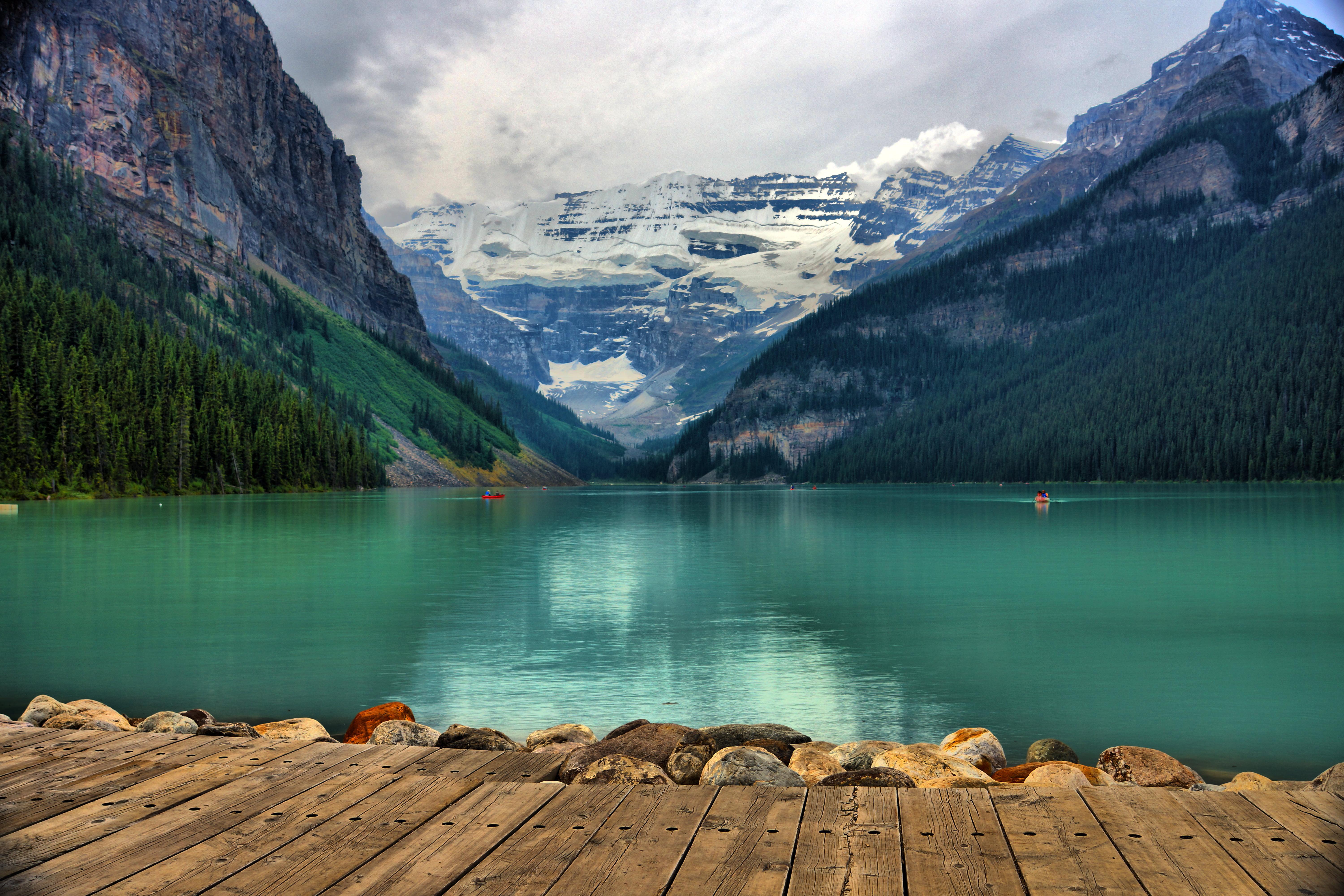 Photography of calm water near mountain at daytime, lake