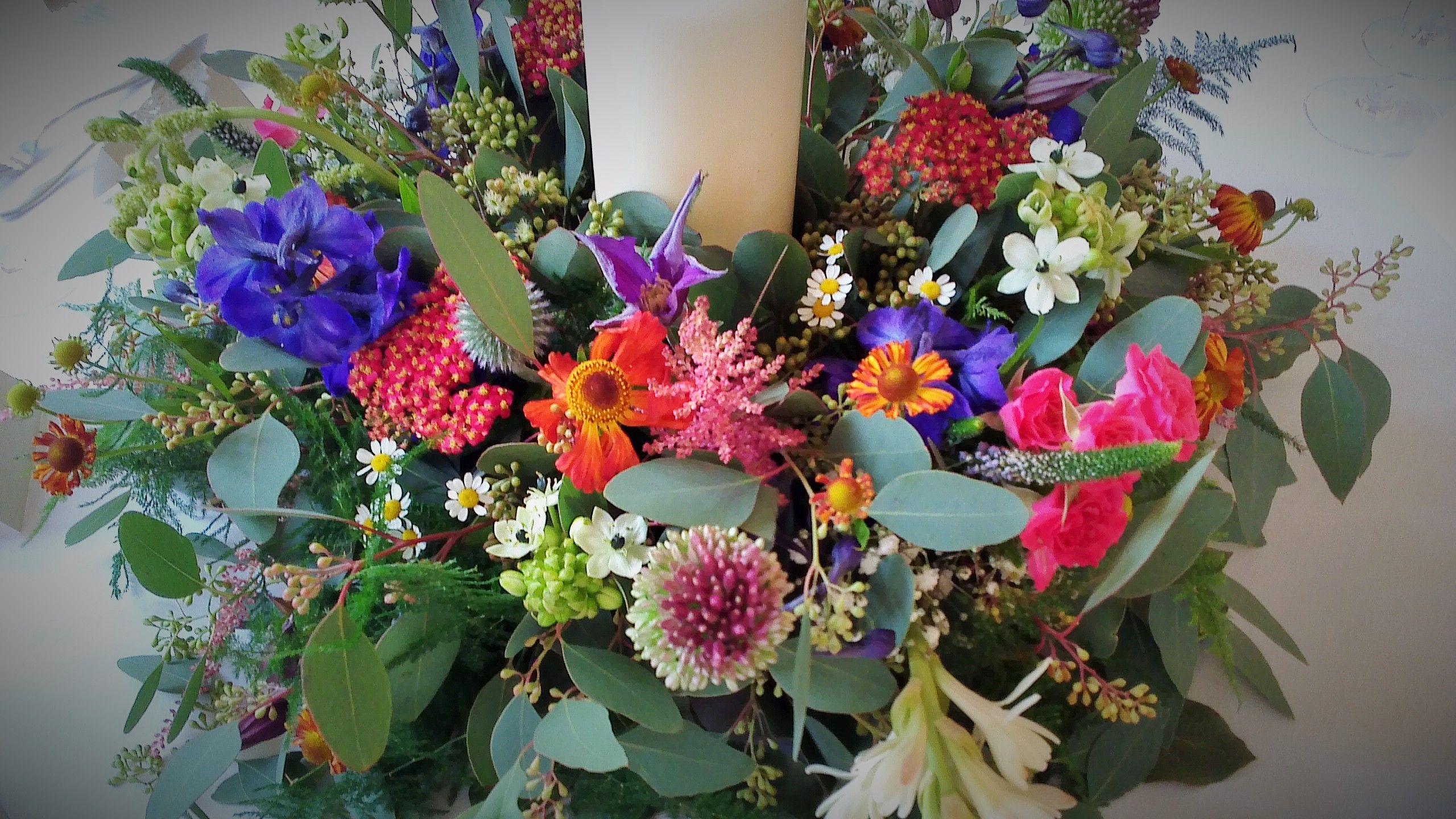 Unstructured vibrant flowers from The Wilde Bunch. Candles