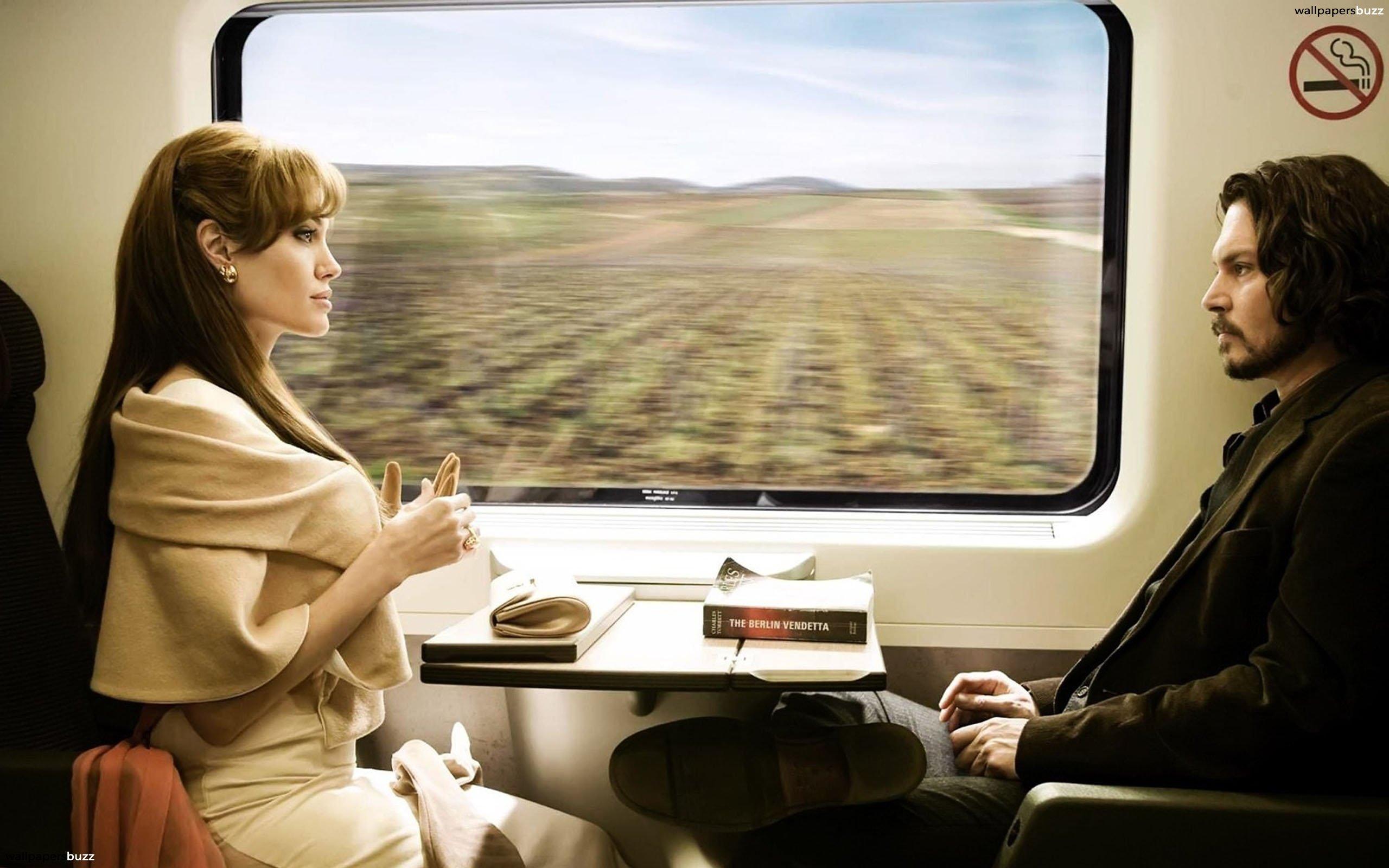 Angelina Jolie in a train HD Wallpaper