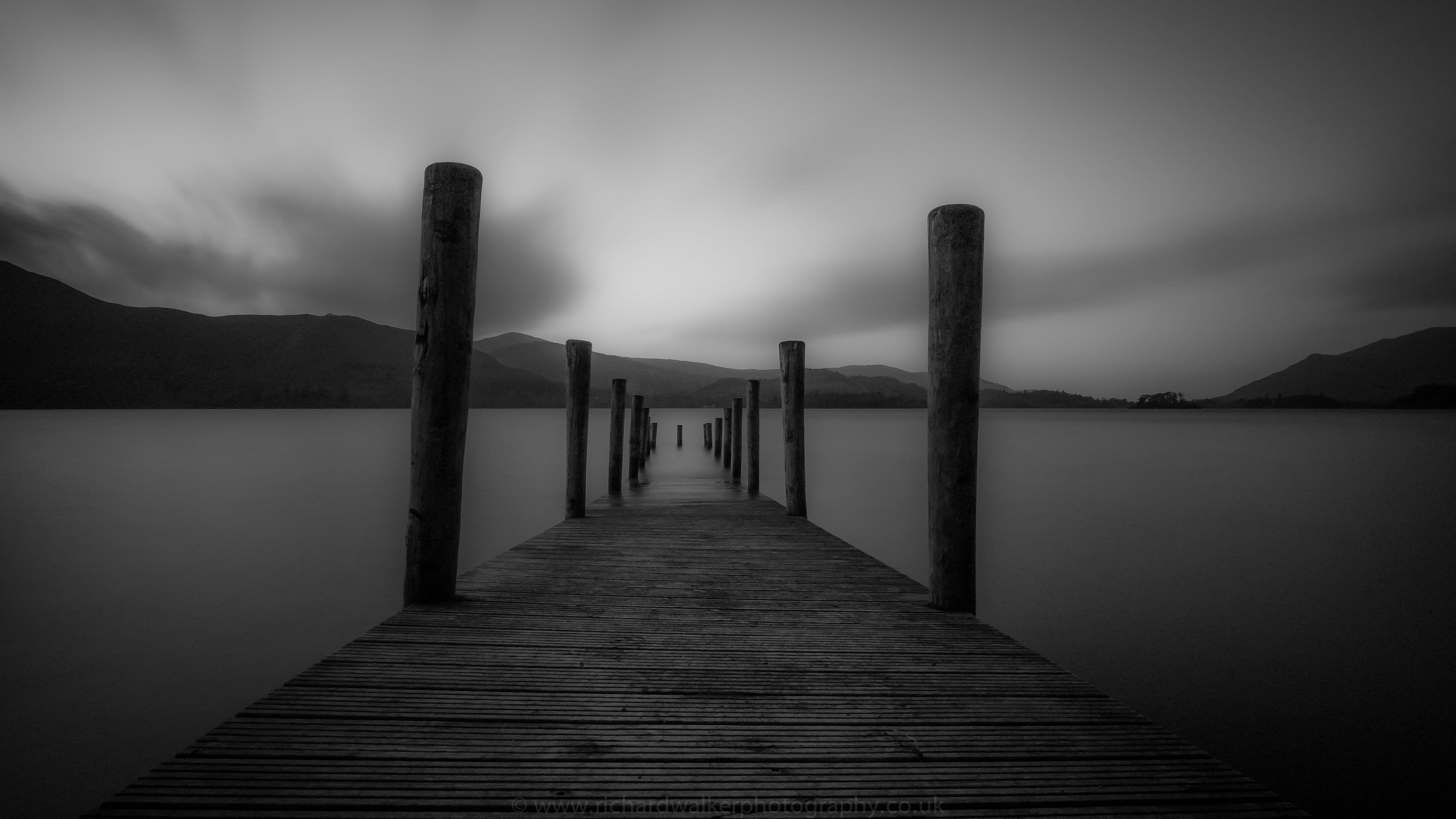 Grayscale photography of fishing dock HD wallpaper