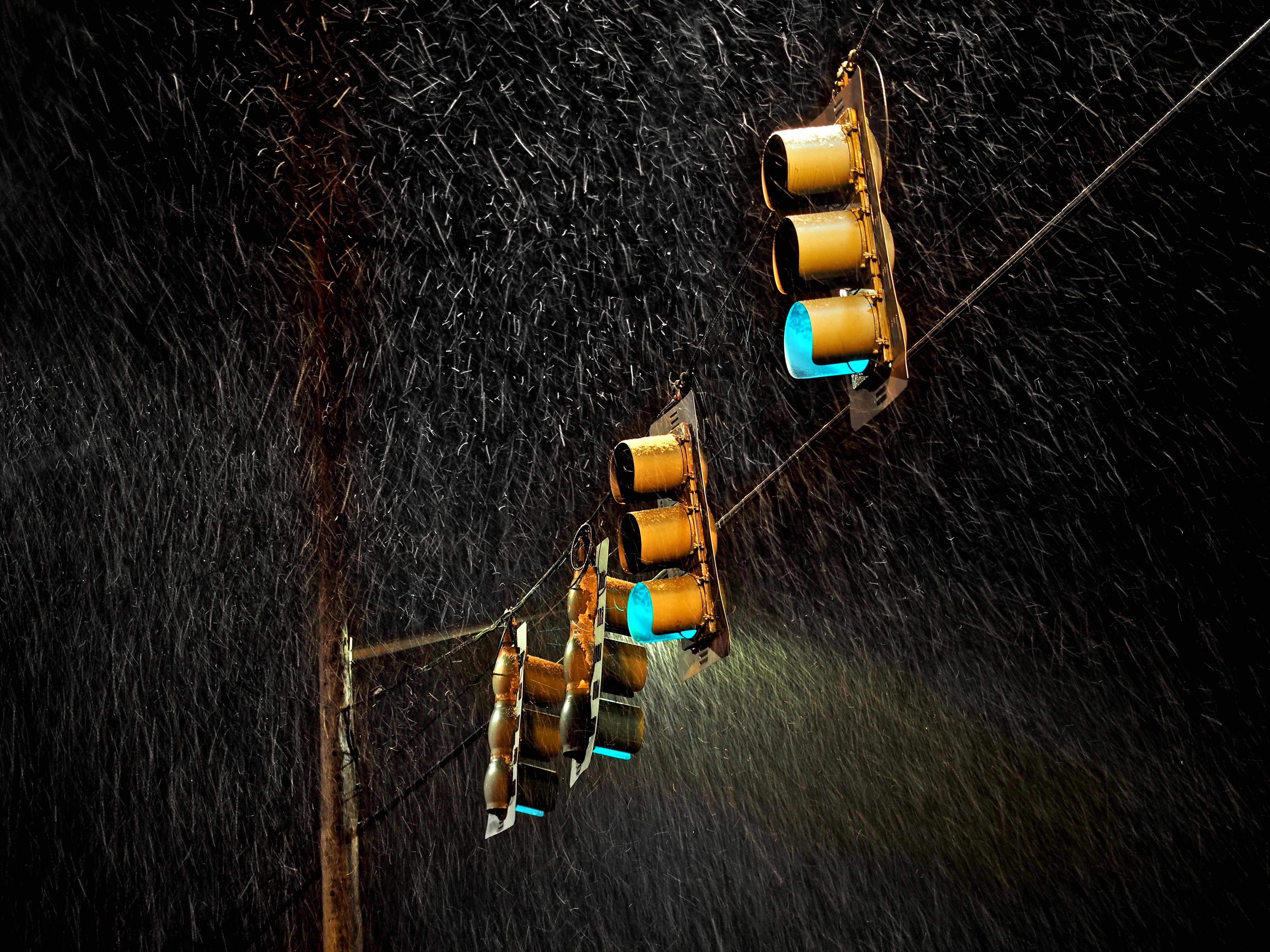 Four Traffic Lights Under the Rain · Free