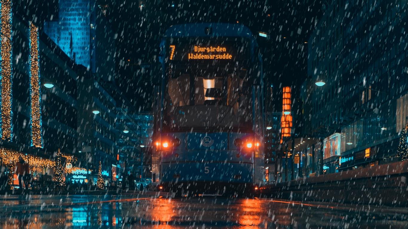 Download wallpaper 1366x768 rain, transport, city, evening