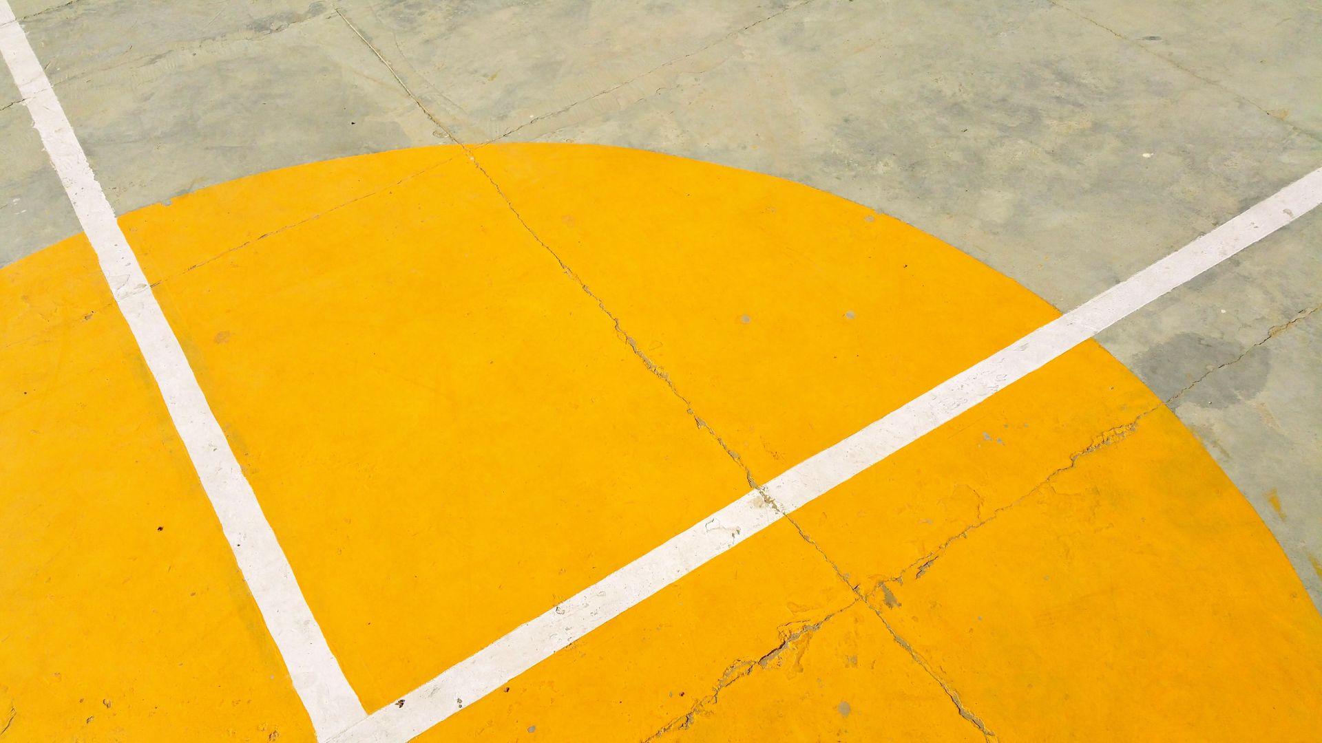 Gray Pavement with Yellow and White Paint Wallpaper