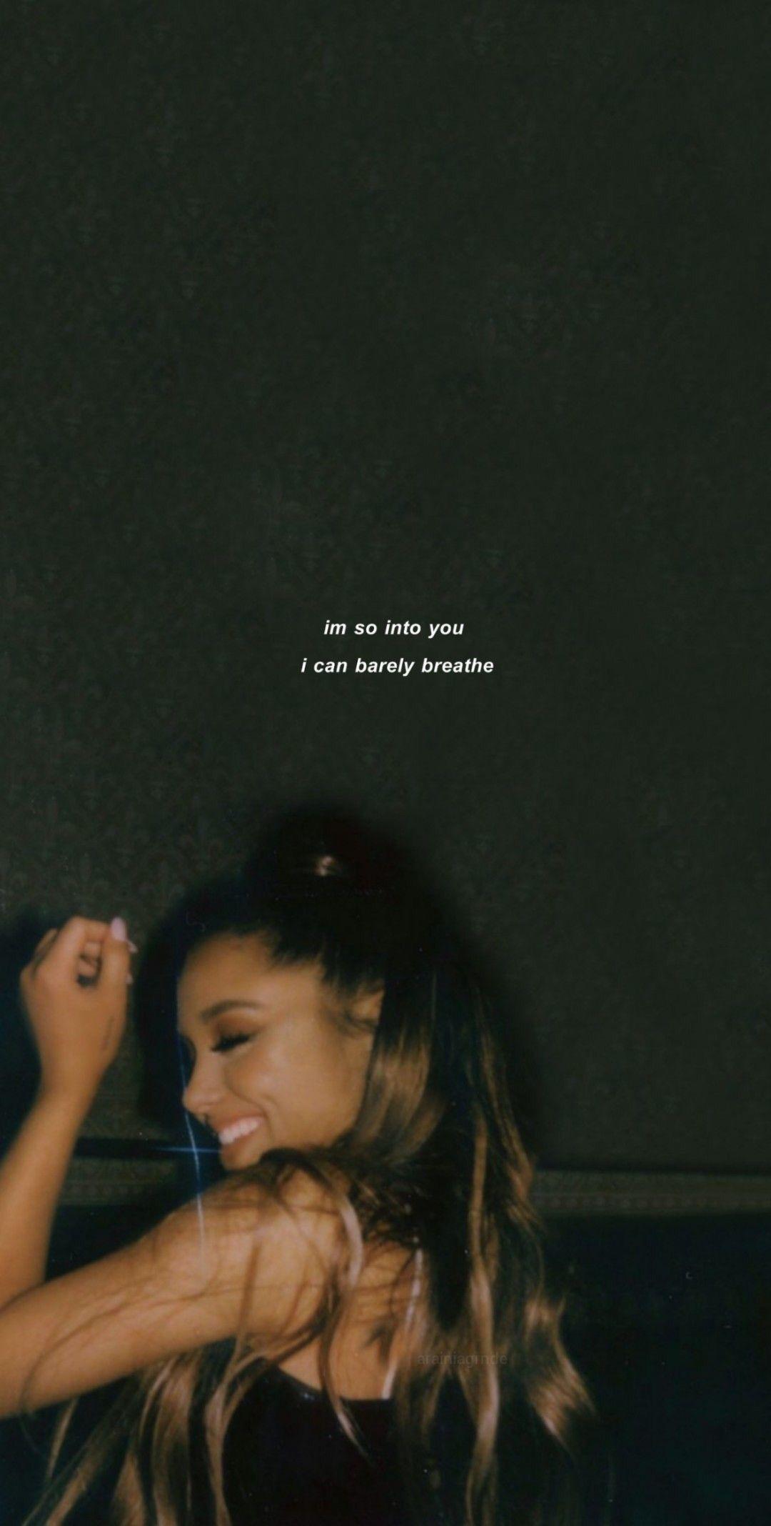 Download Ariana Grande in a vintage-inspired aesthetic setting Wallpaper