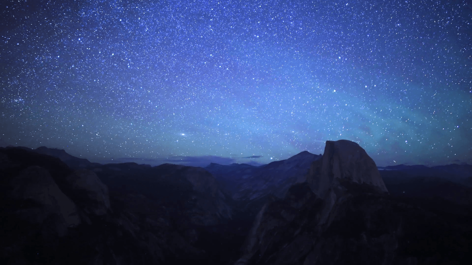 Time Lapse of Star Trails over Half Dome in Yosemite National Park -Pan R- Stock Video Footage