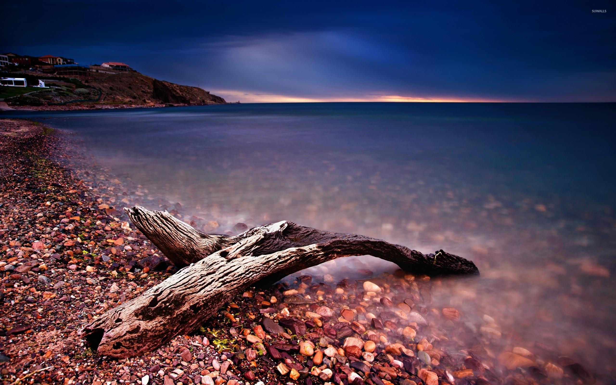 Pebble beach at sunset wallpaper wallpaper