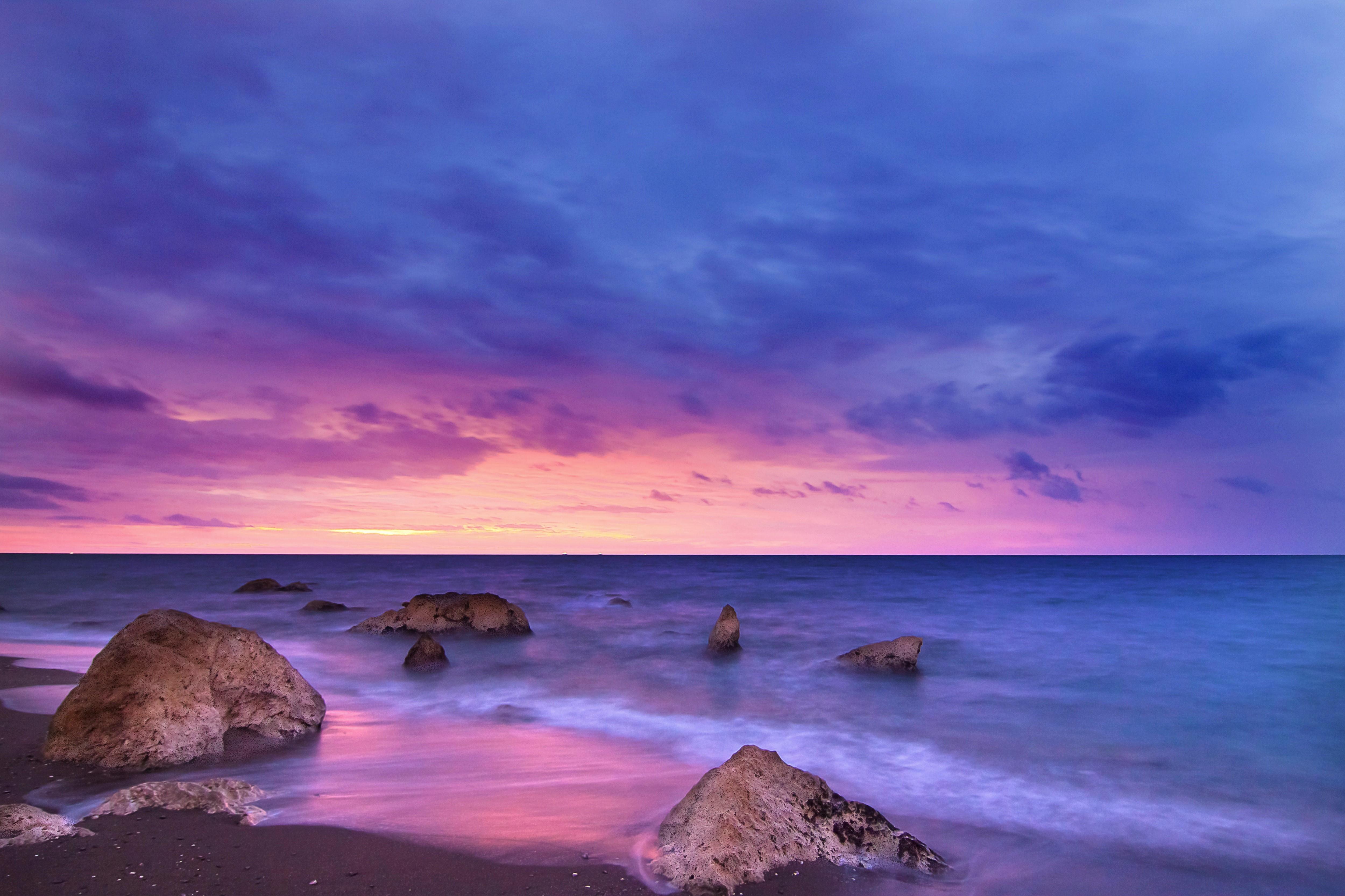 Pink and Purple Beach Sunset 4k Ultra HD Wallpaper. Background