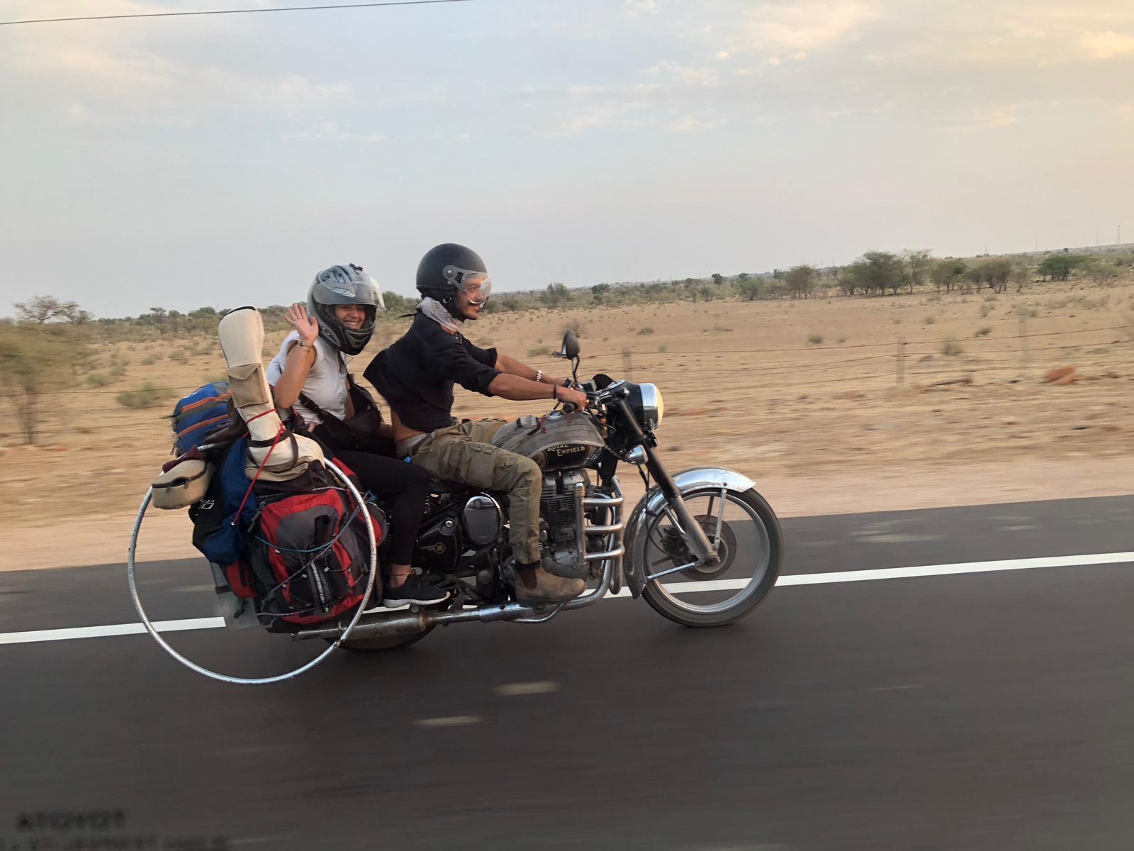 Cool motorcycle couple ridingat Indian