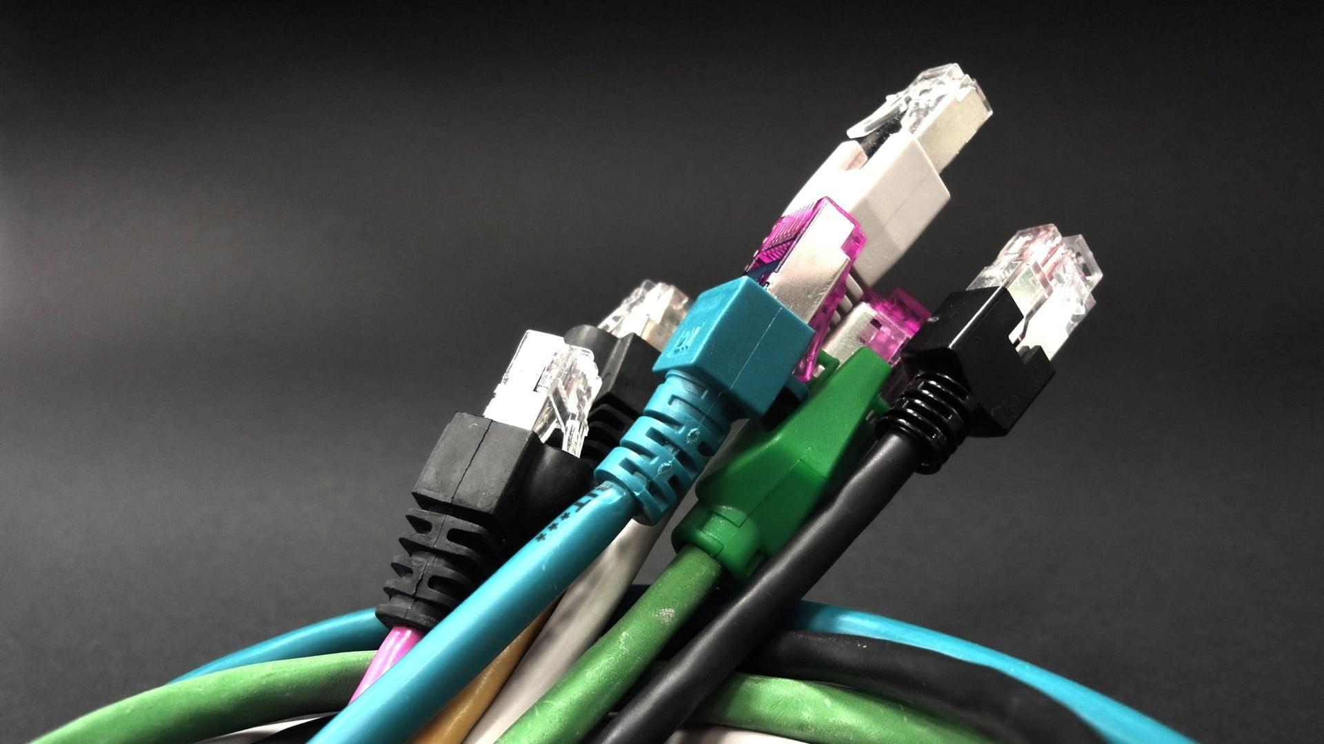 Macro Shot: Ethernet Data Cables Connected to Router Ports with Blinking  Lights. Telecommunications: RJ45 Internet Connectors Plugged into Modem LAN  H Stock Photo - Alamy