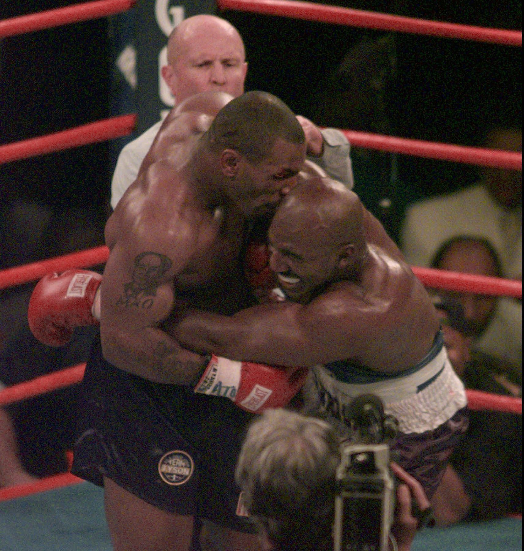 Evander Holyfield opens up about Mike Tyson infamously