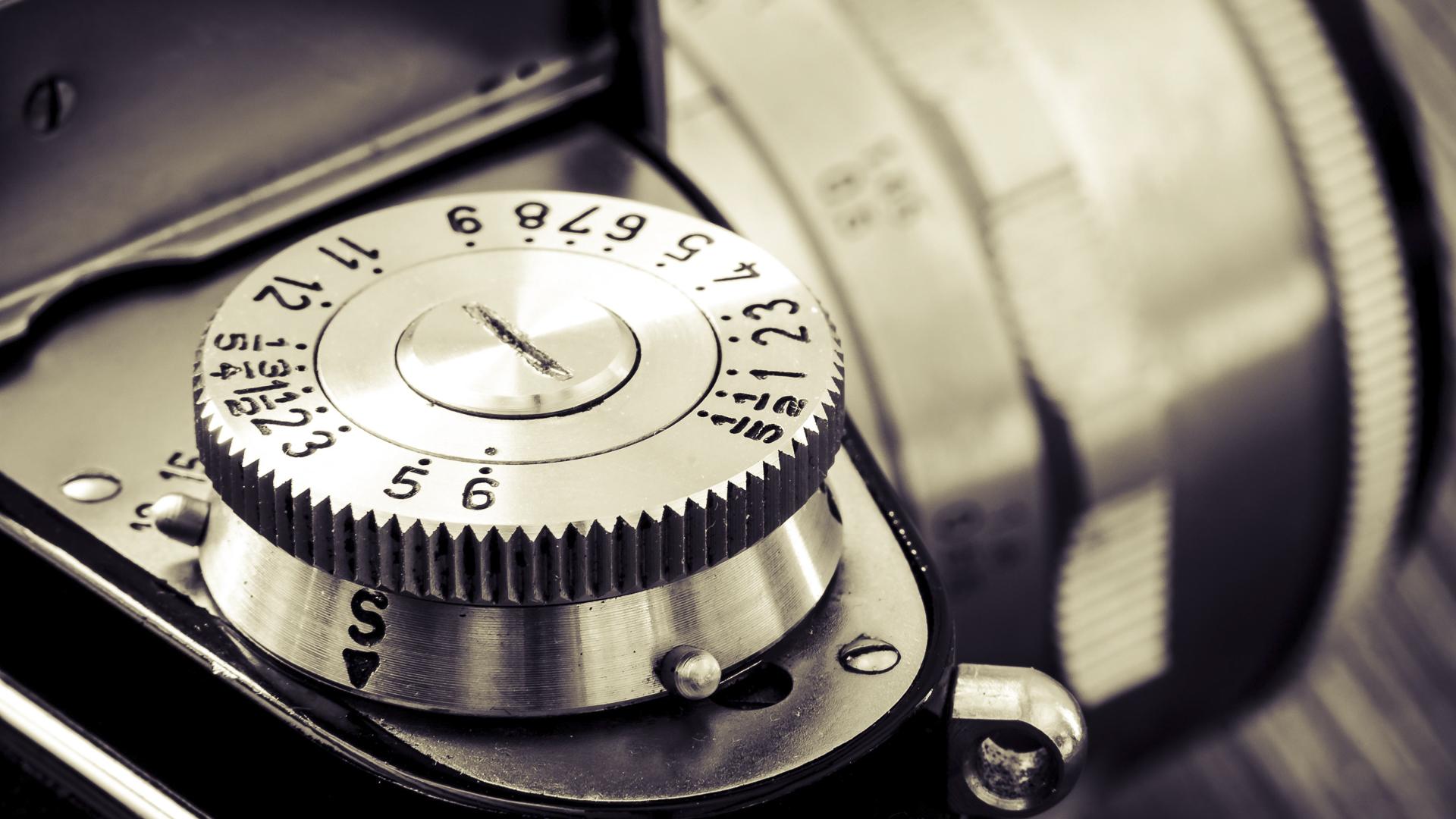 Detail of old classic camera in vintage style. Windows 10