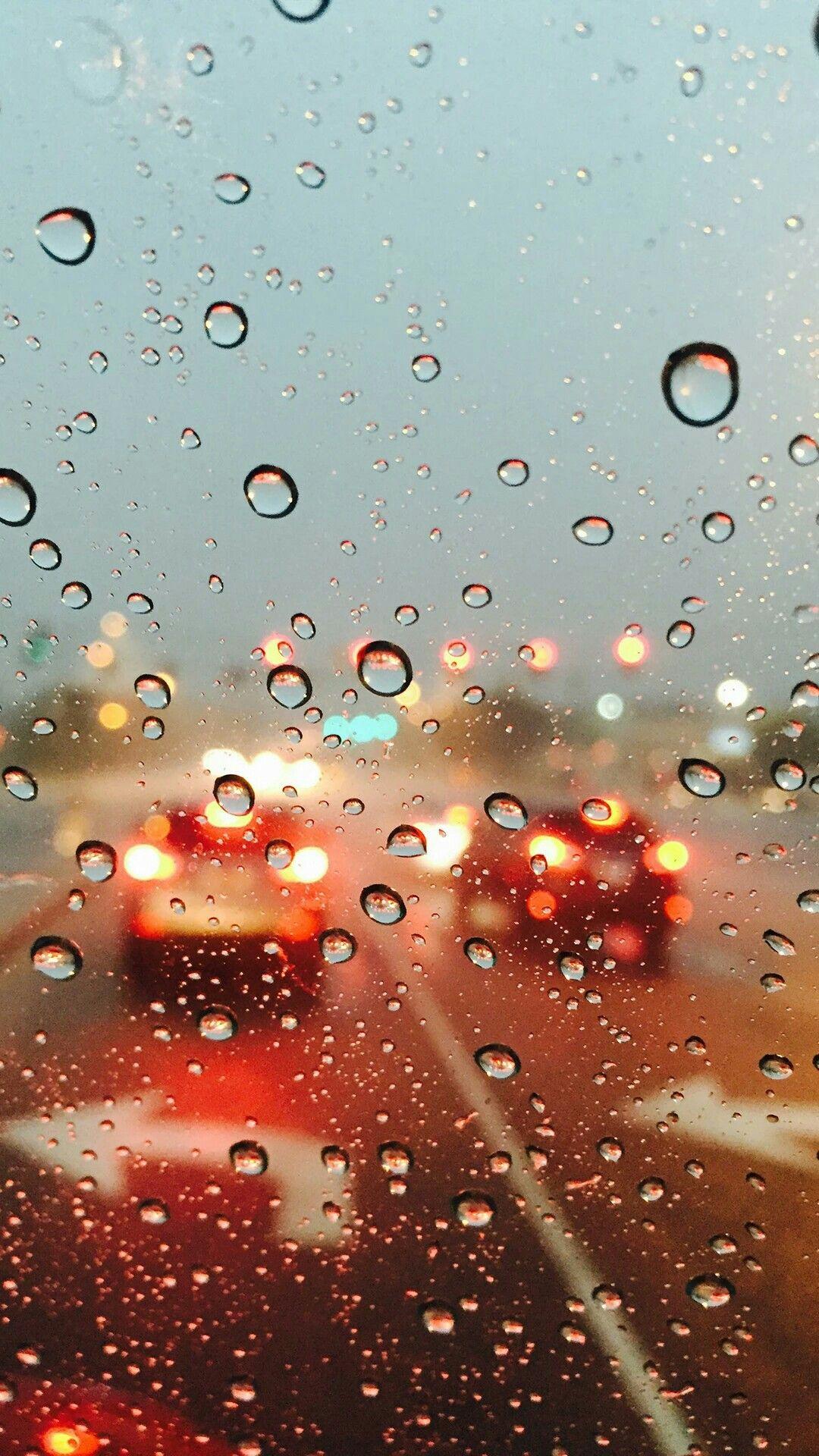 Photography of Window View and raindrops during a raining