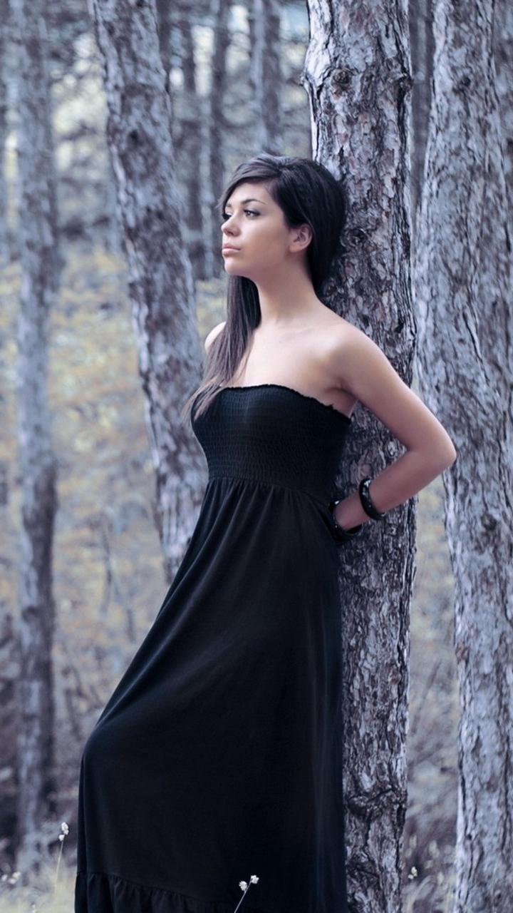 Download wallpaper 720x1280 girl, dress, wood, photo shoot