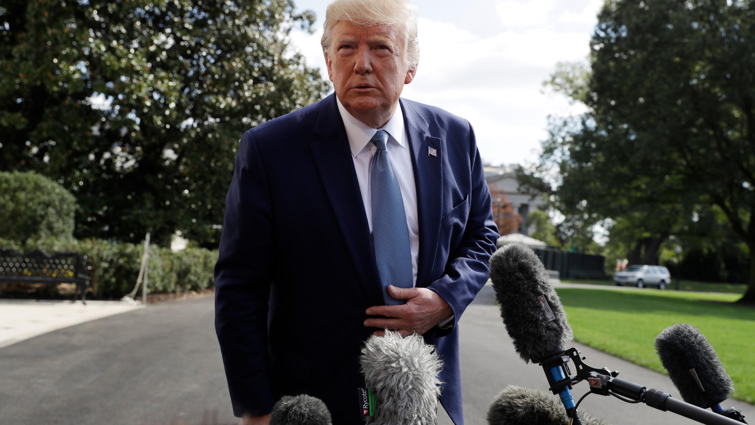 The Latest: Trump denies quid pro quo with Ukraine