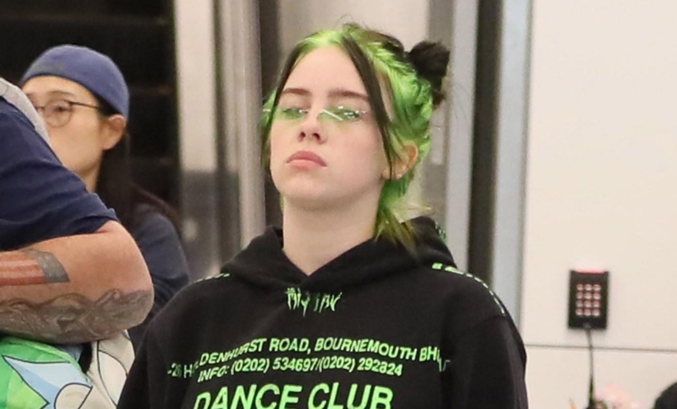 Billie Eilish Matches Neon Green Hair with Her Outfit
