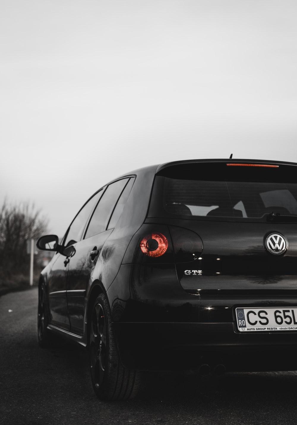 black Volkswagen Polo GTI grayscale closeup photography