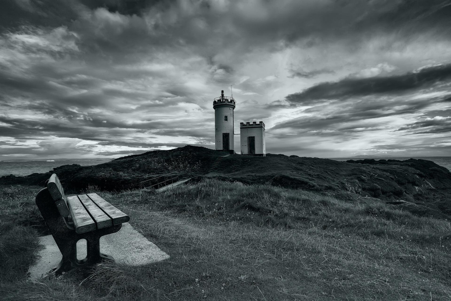 Lighthouse sea bench landscape sky clouds black white