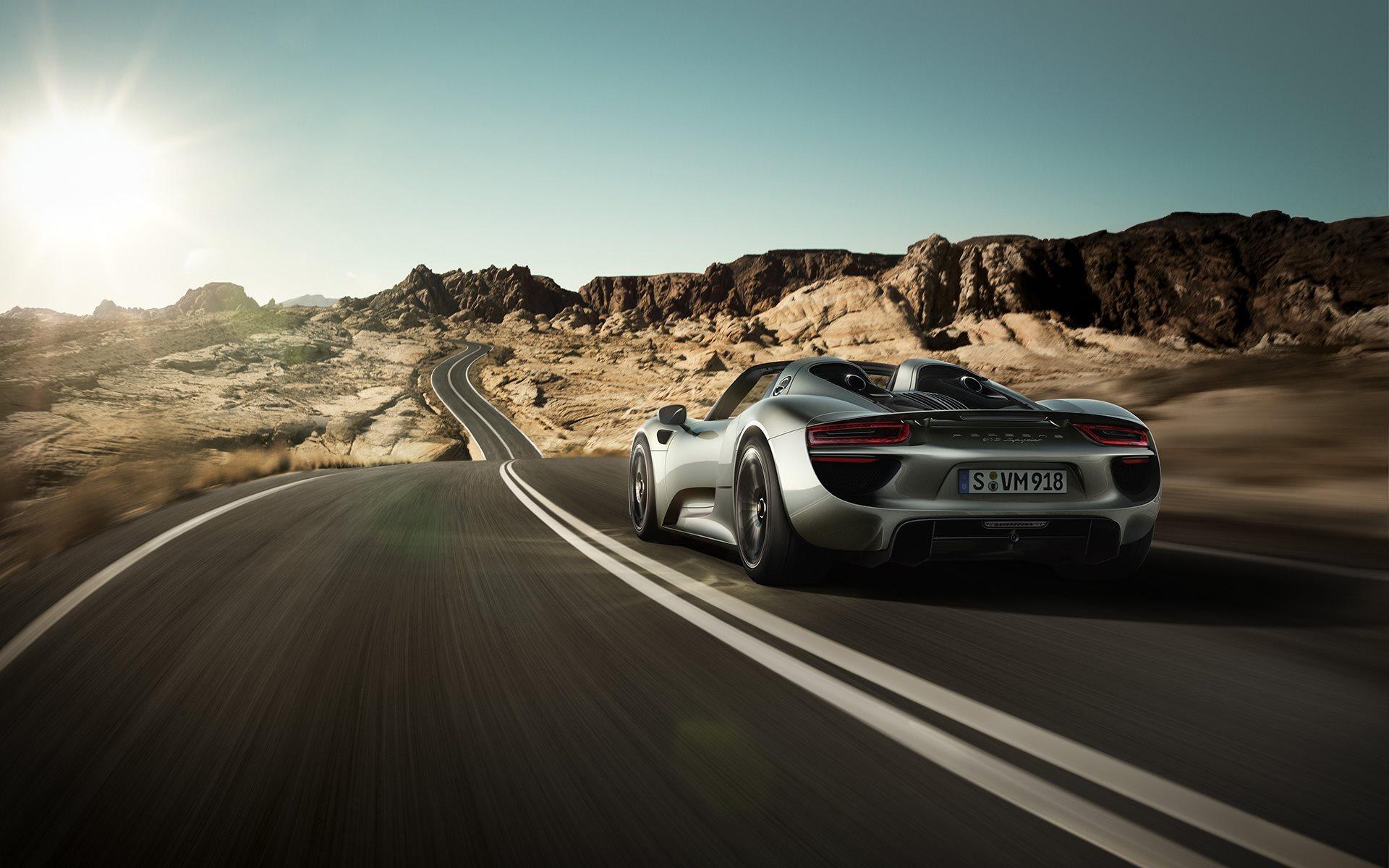 HD Porsche 918 on the desert road Wallpaper. Download Free