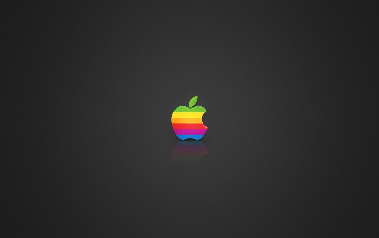 Coloured Apple logo wallpaper. Coloured Apple logo stock