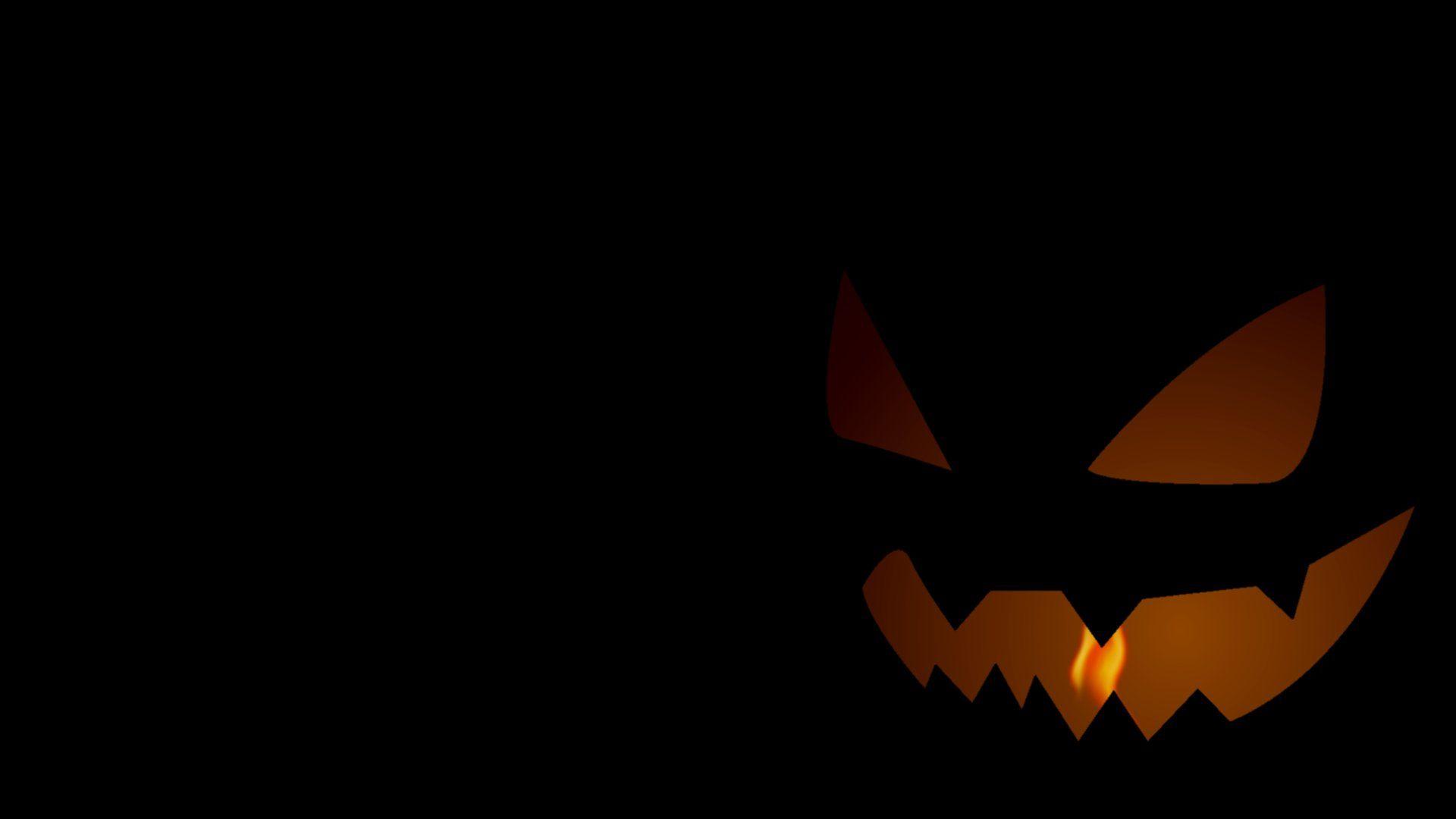 Scary Jack O Lantern. Minimal Simple Halloween Wallpaper