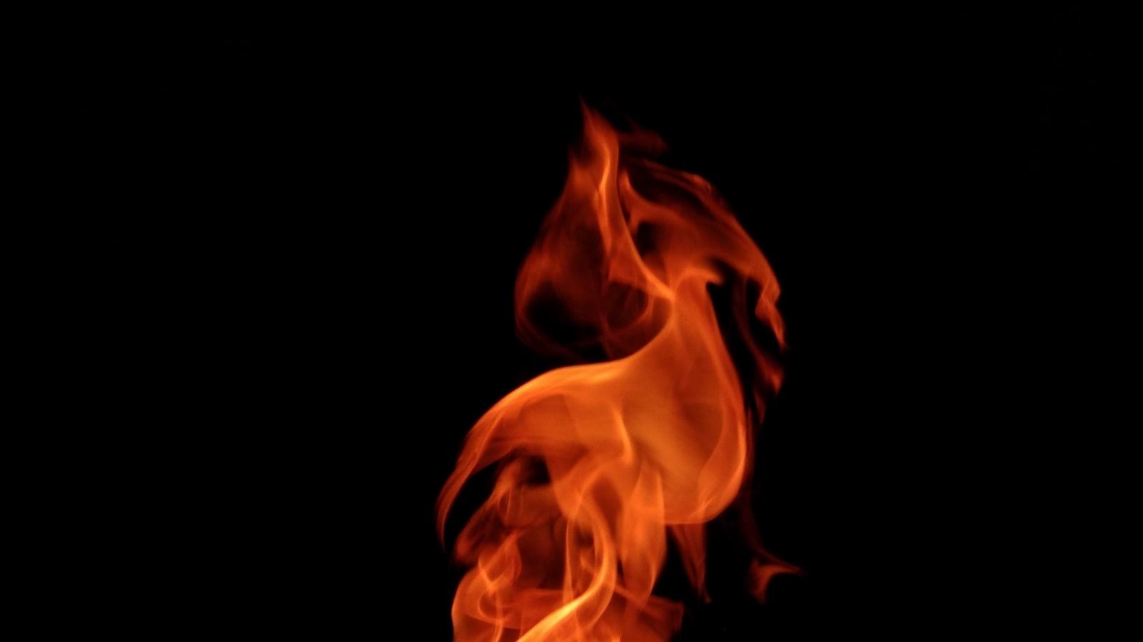 Download wallpaper 1600x900 fire, flame, dark, darkness