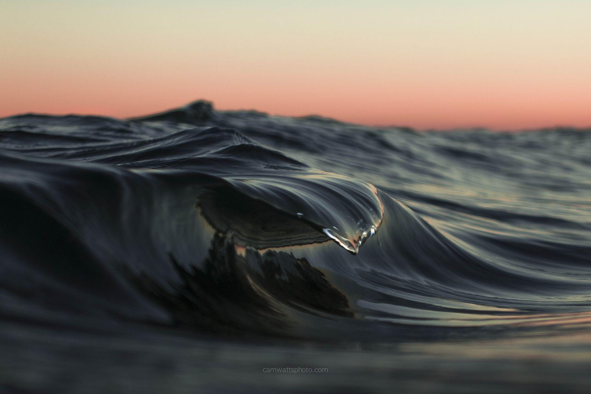 Mini Break small wave Breaks over a large rock. Nature