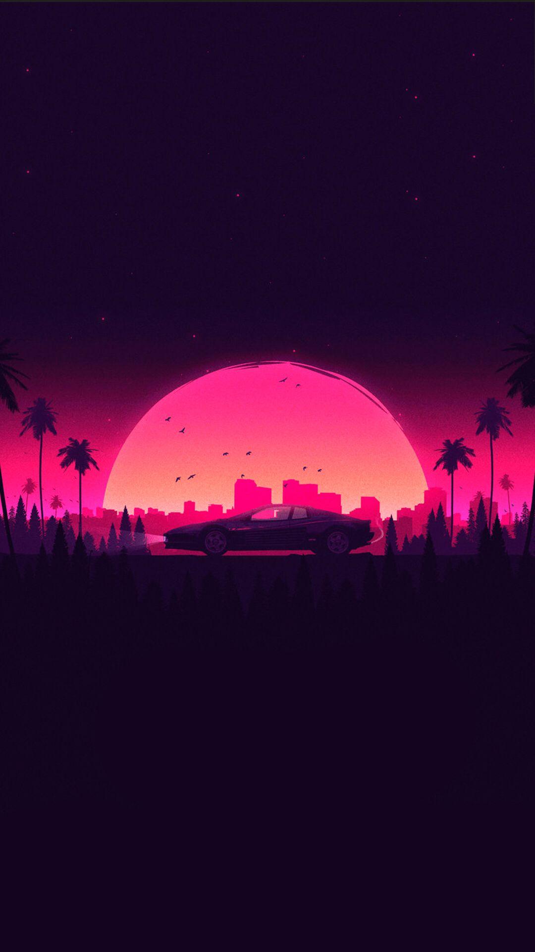 Car, palm trees and city in front of a pink sunset