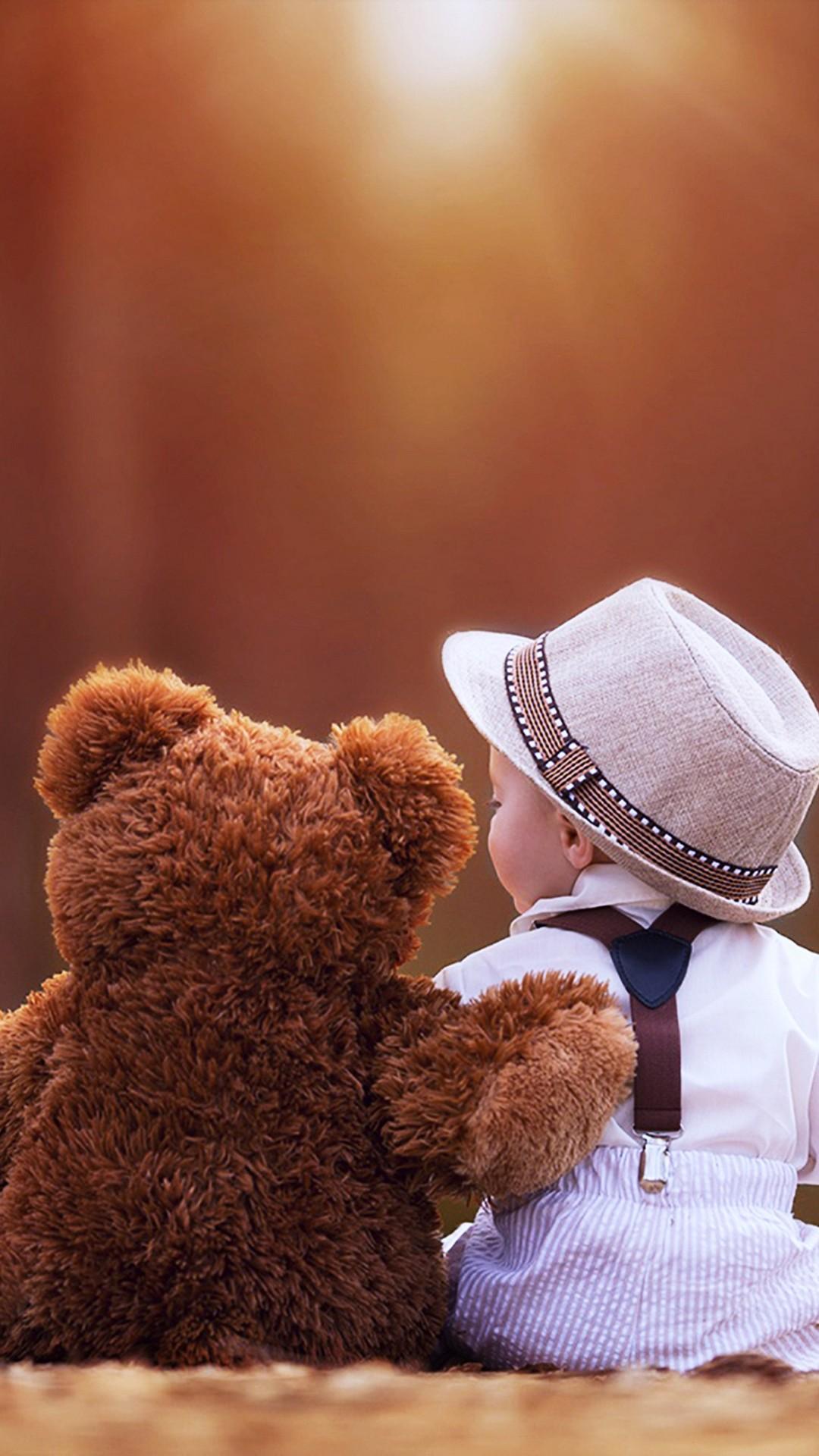 Premium Photo | Teddy bear with woolen clothes holding a heart on blue  background cute valentine day postcard with copy space generative ai