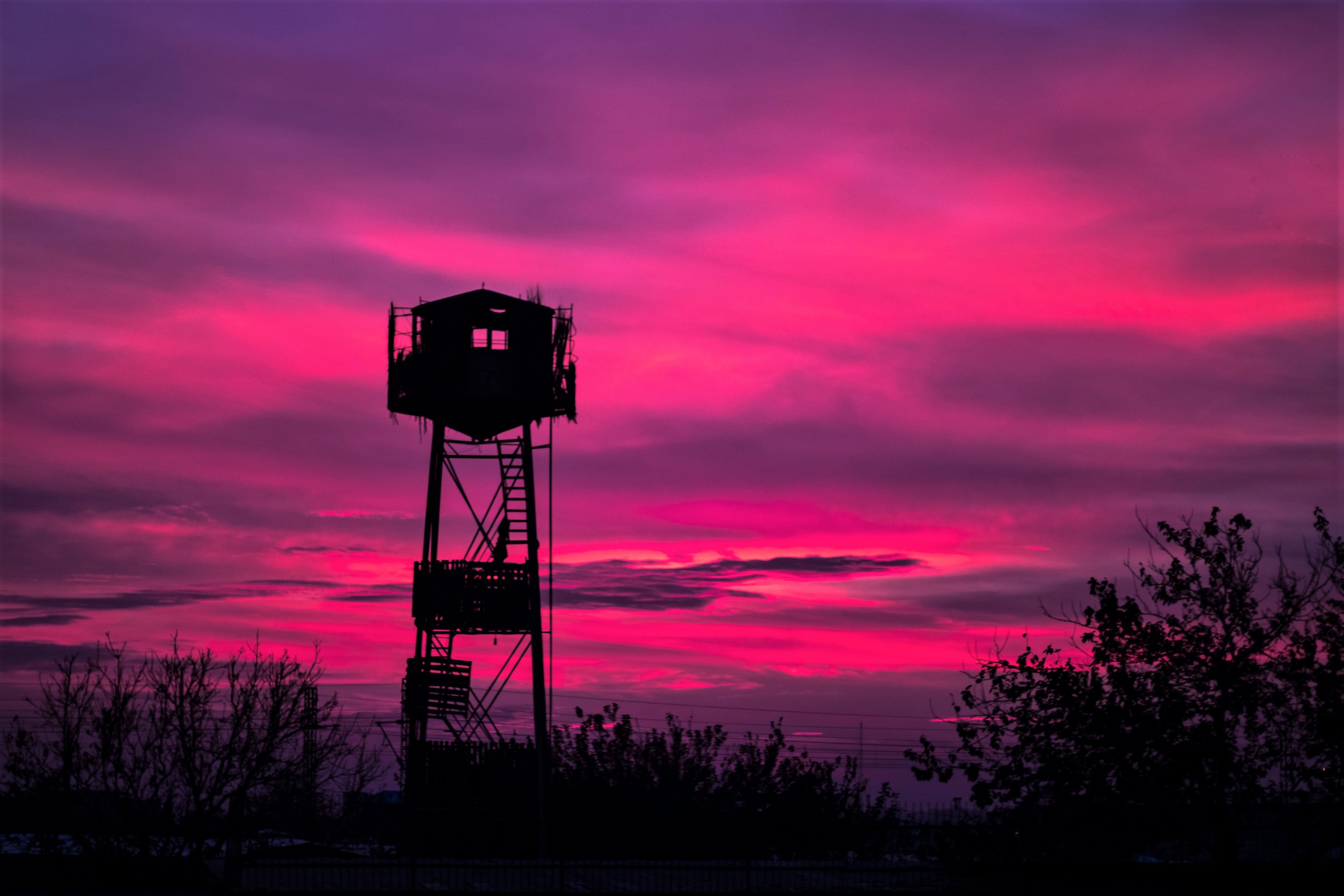 Watchtower Silhouette in Pink Sunset HD Wallpaper