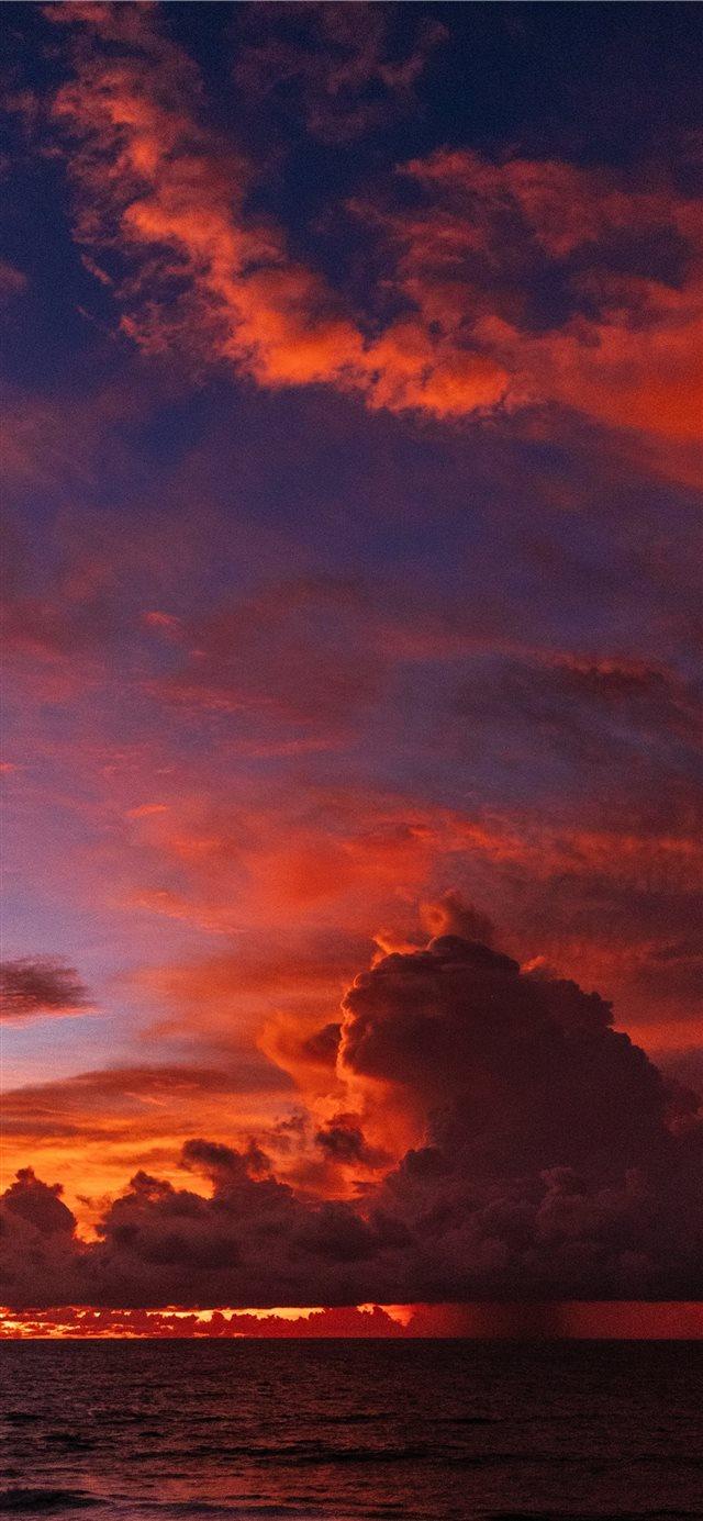 ocean under orange colored clouds iPhone 11 Wallpaper Free Download
