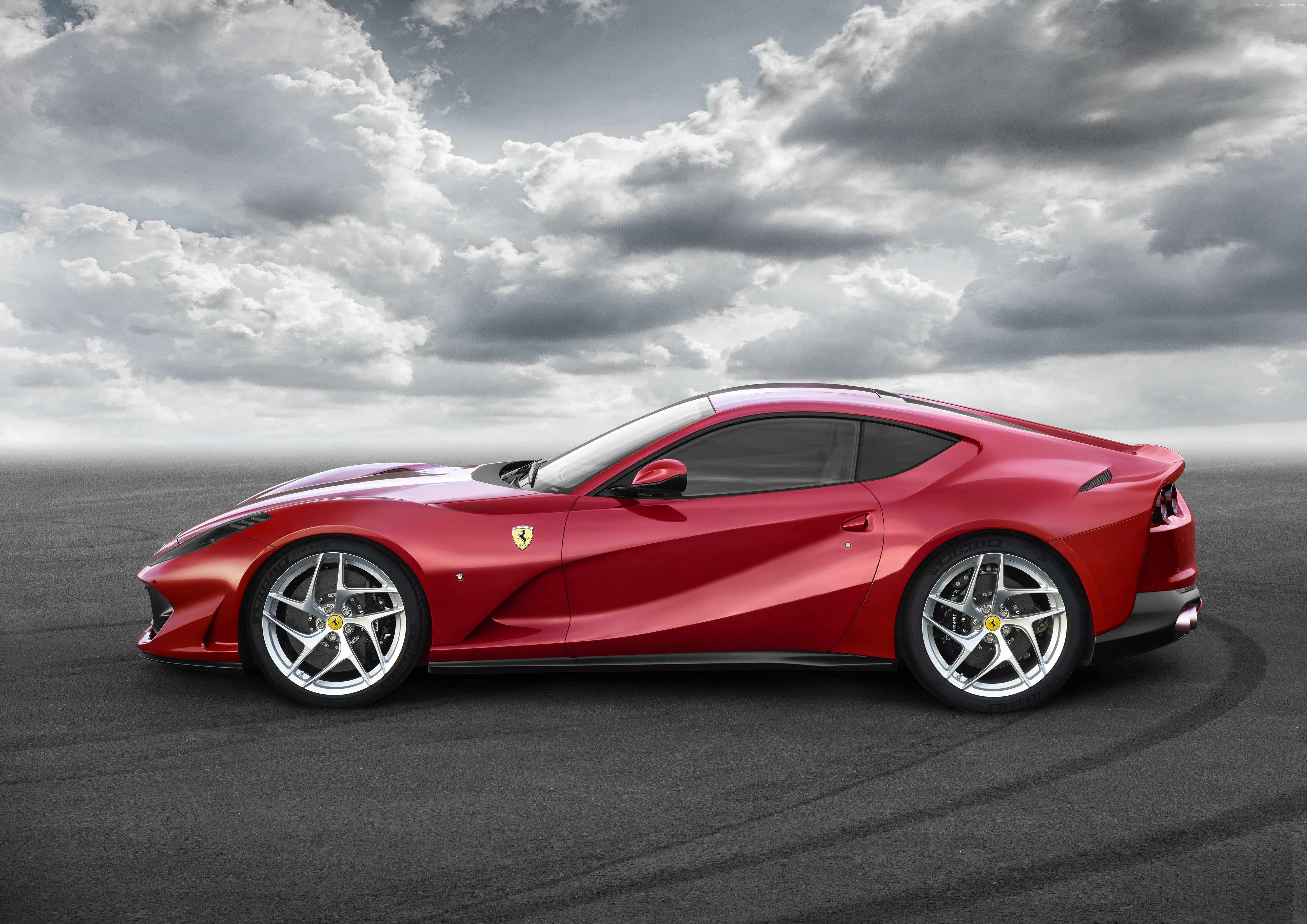 Red Ferrari sports car HD wallpaper