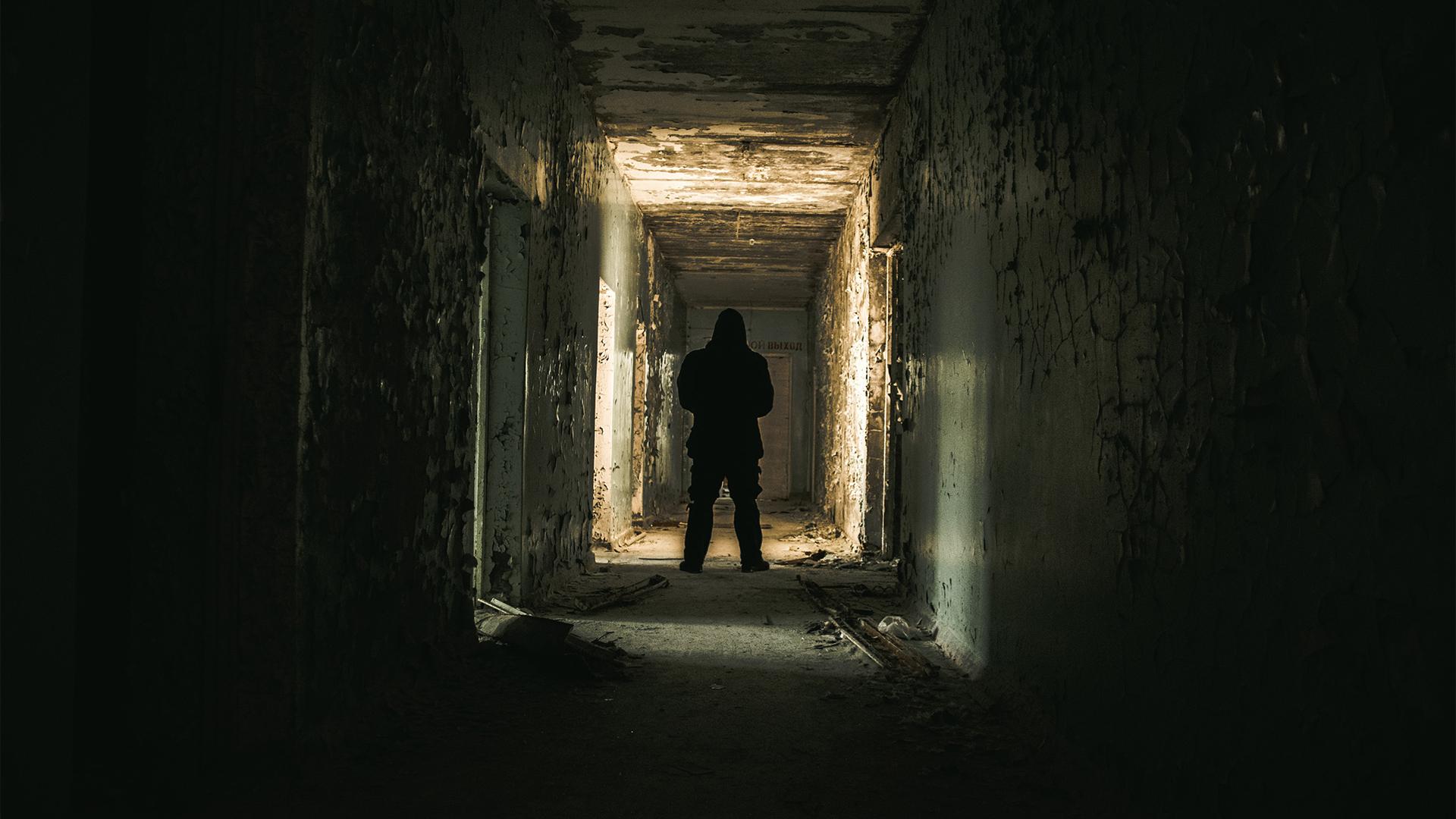 Stranger in a corridor. Wallpaper from Chernobylite