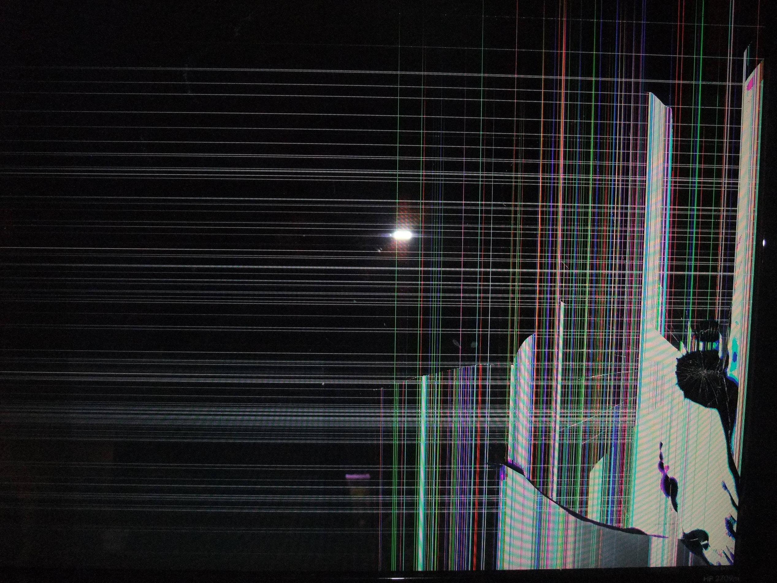 Cracked TV Screen Prank Wallpaper