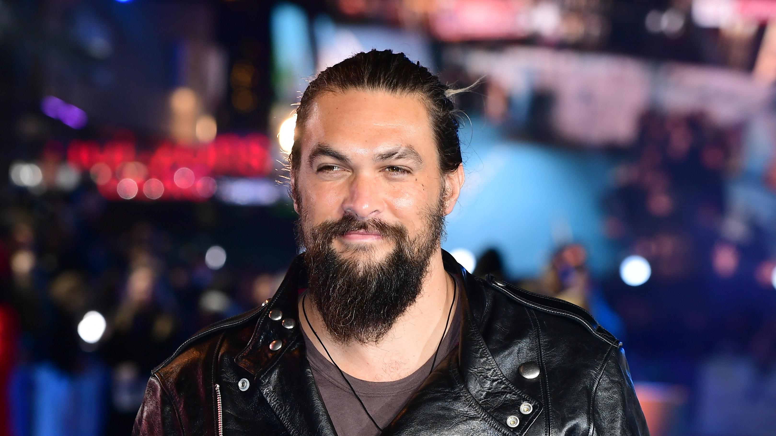 Watch Jason Momoa feed a bear a biscuit out of his mouth