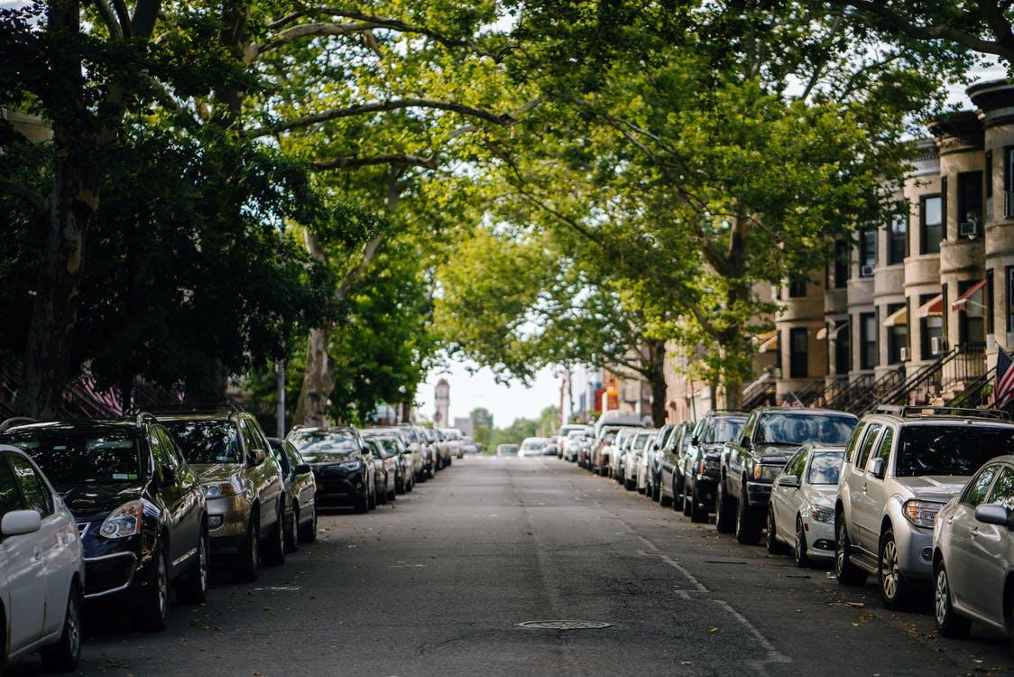 Photo of Cars Parked Along Roadside · Free