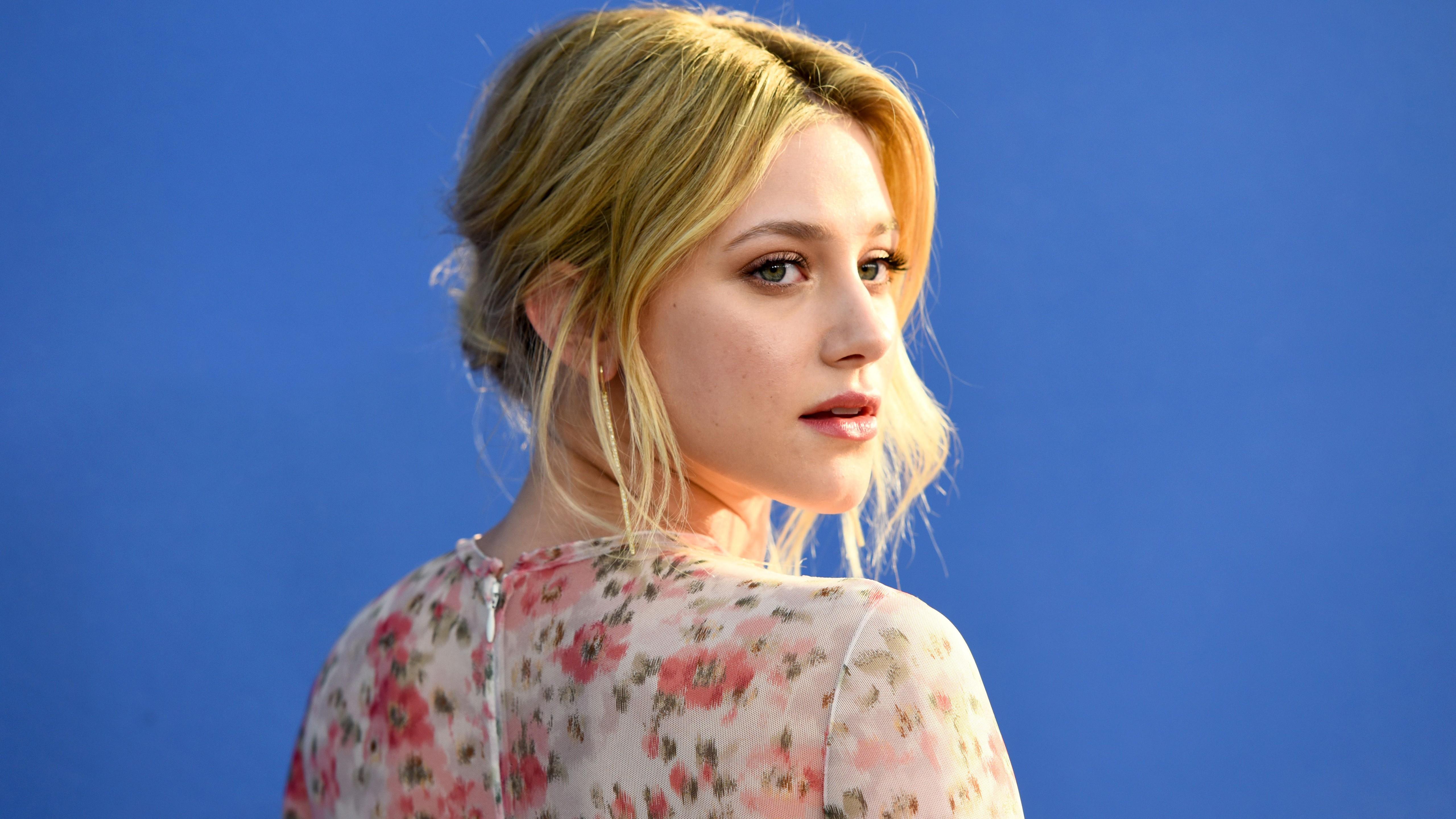 Beautiful blonde actress Lily Reinhart Desktop wallpaper