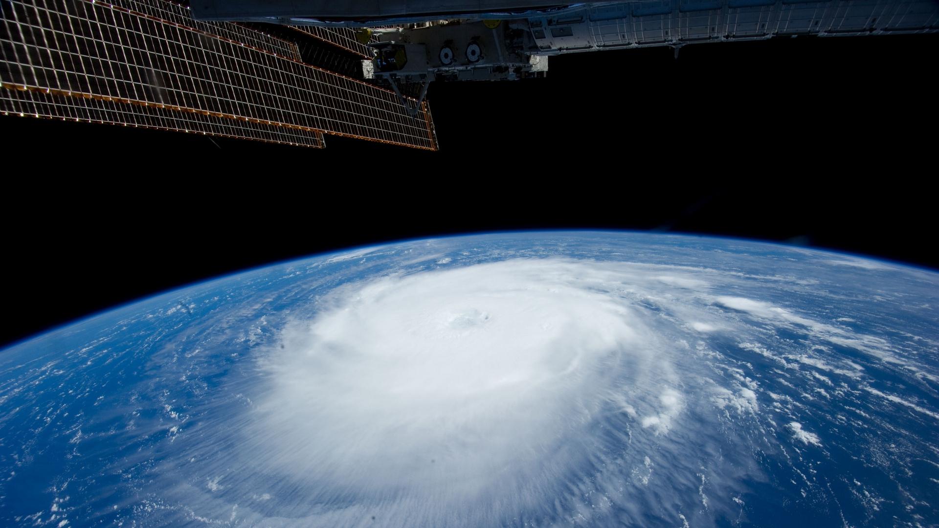 Download wallpaper 1920x1080 hurricane, iss, earth, clouds
