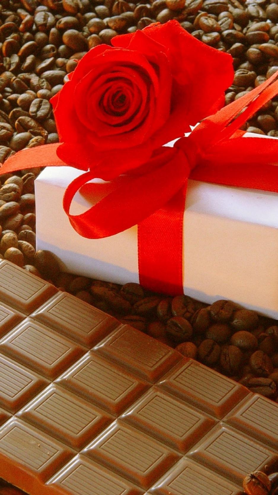 Download wallpaper 938x1668 gift, ribbon, rose, chocolate