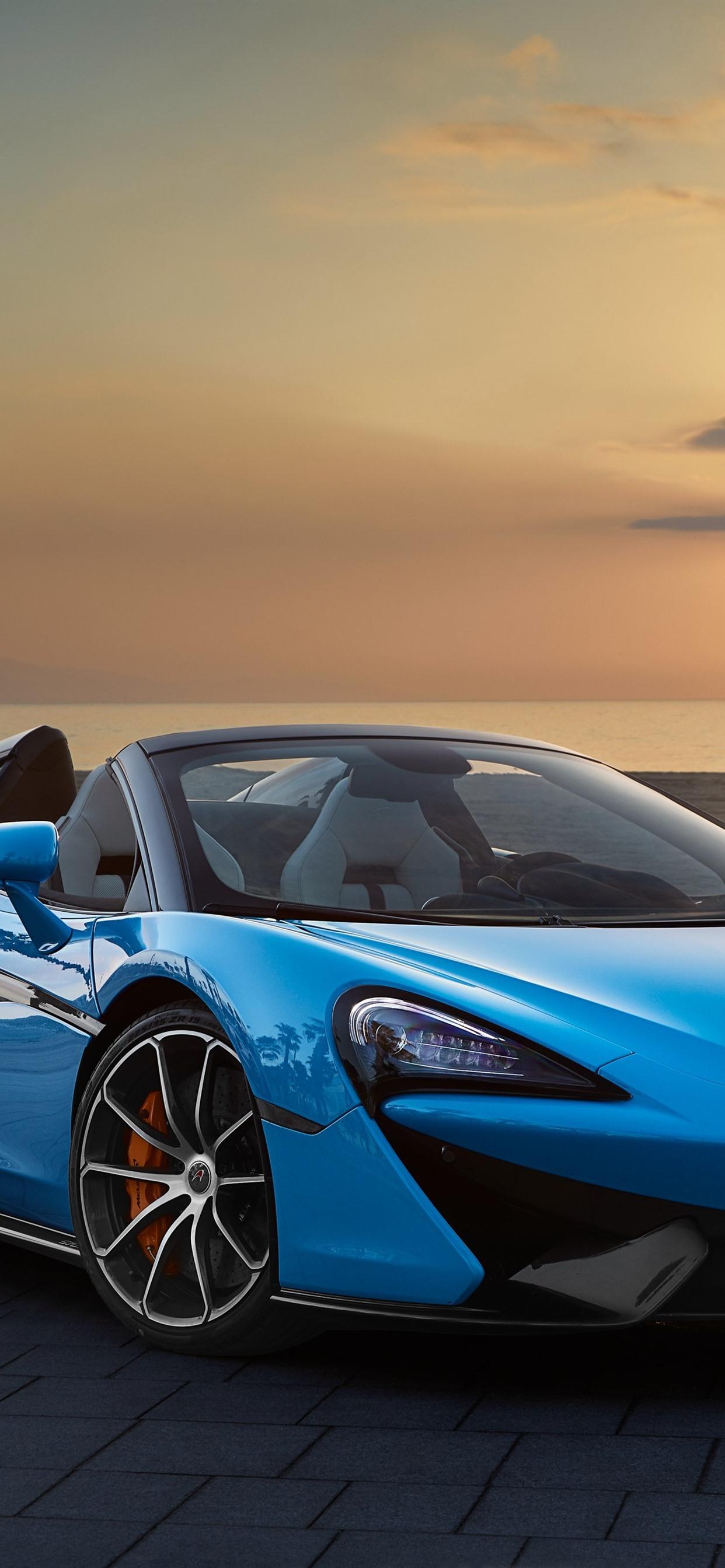 McLaren 570S blue convertible, sunset, sea 1242x2688 iPhone