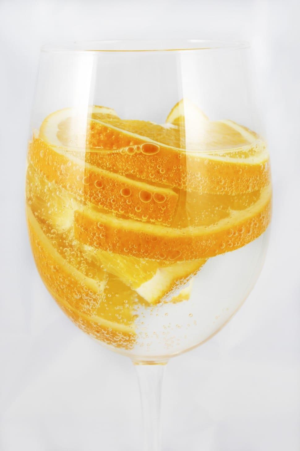 orange fruit in champagne flute free image