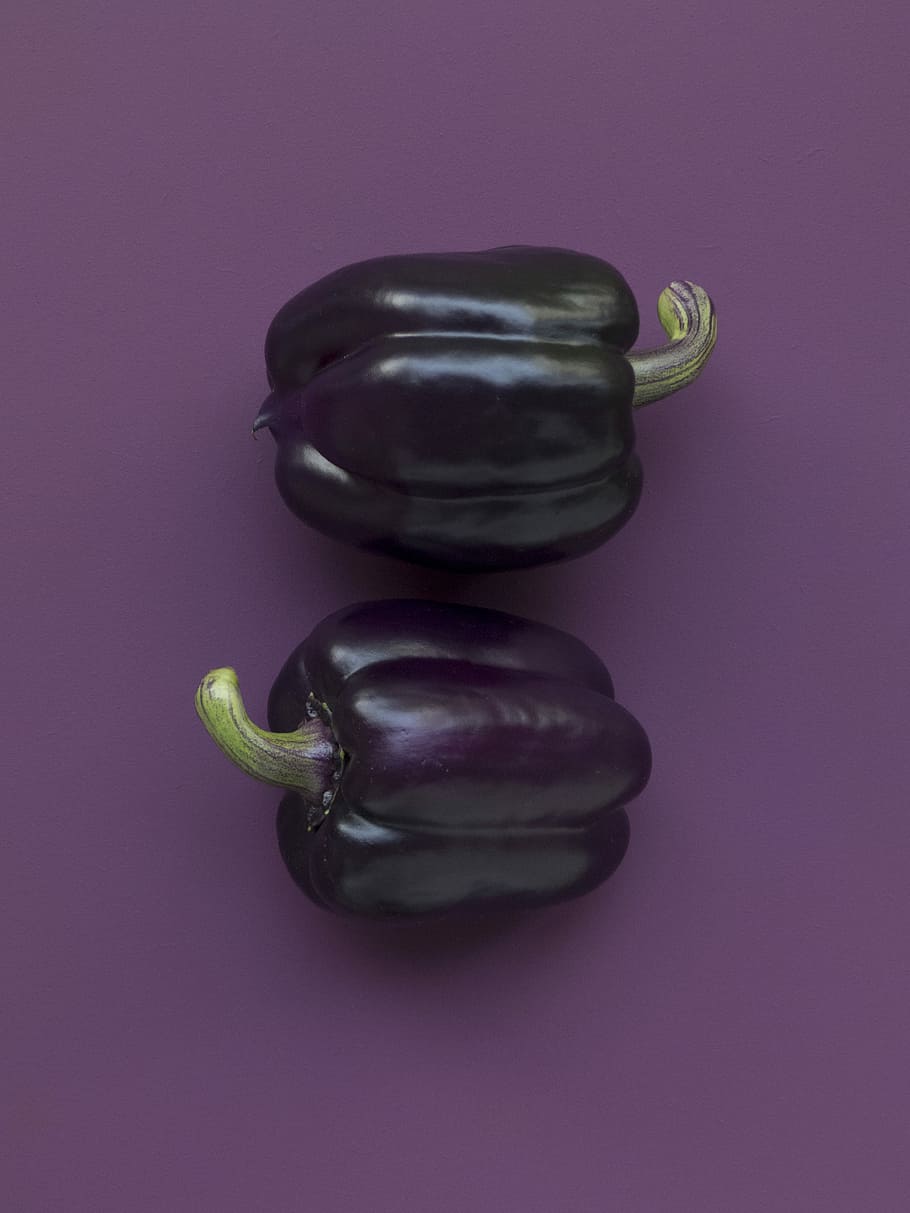 HD wallpaper: two purple bell peppers on purple surface, two
