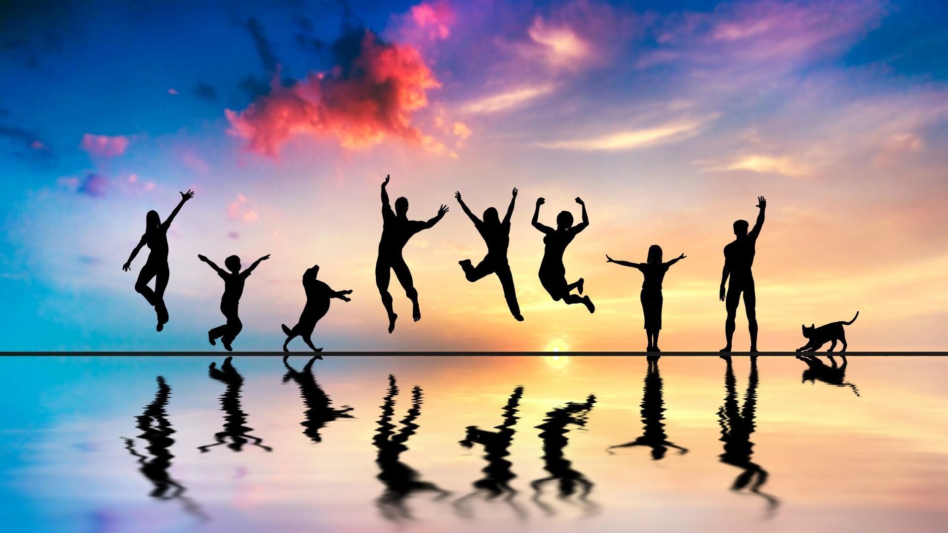 jumping silhouette group of people cat sea reflection Wallpaper