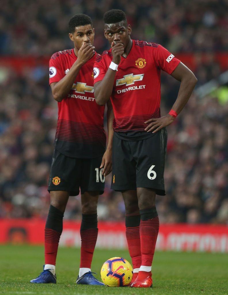 marcus rashford and paul pogba of manchester united discuss