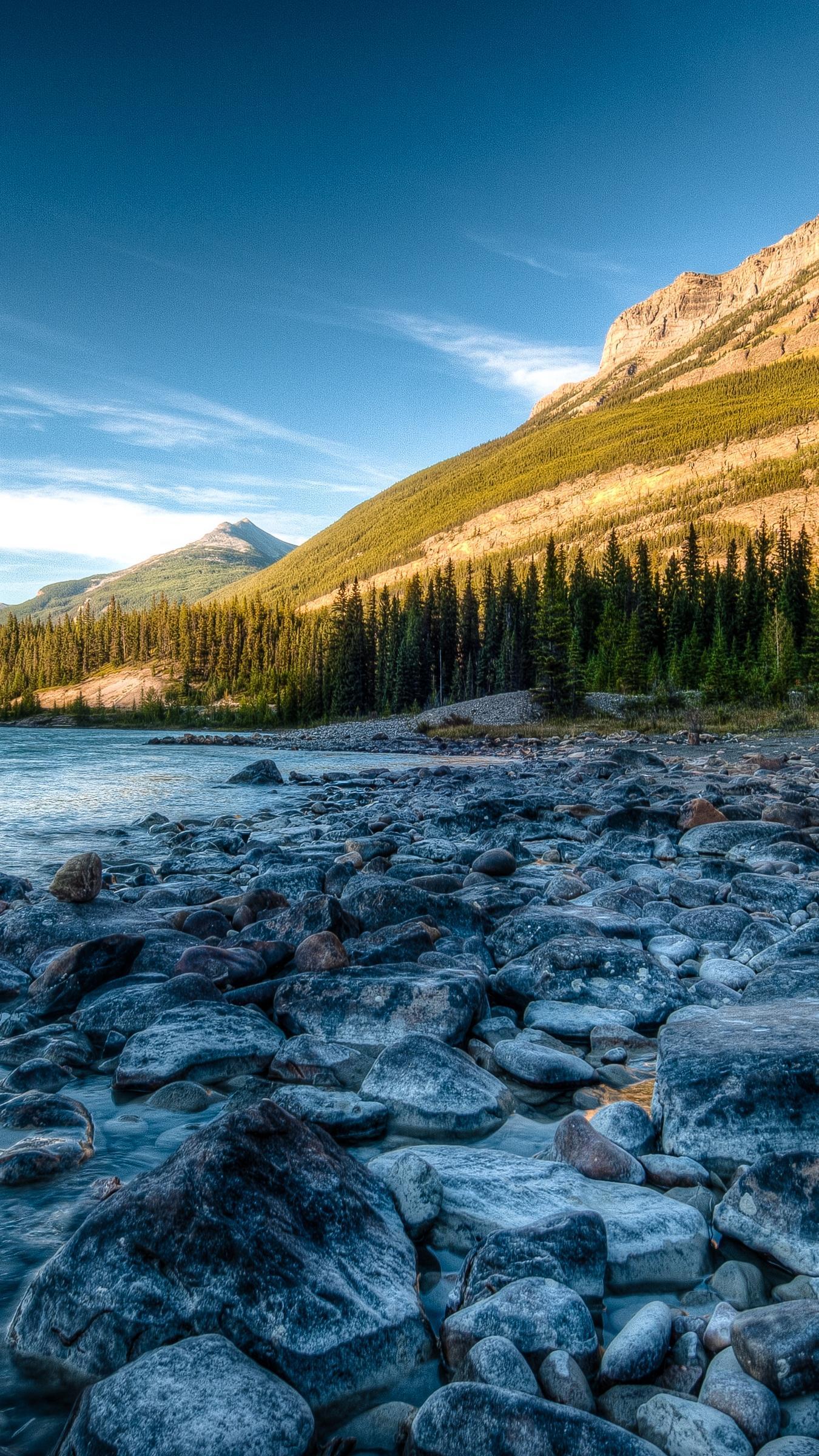 Download wallpaper 1350x2400 rocky mountains, river, stones
