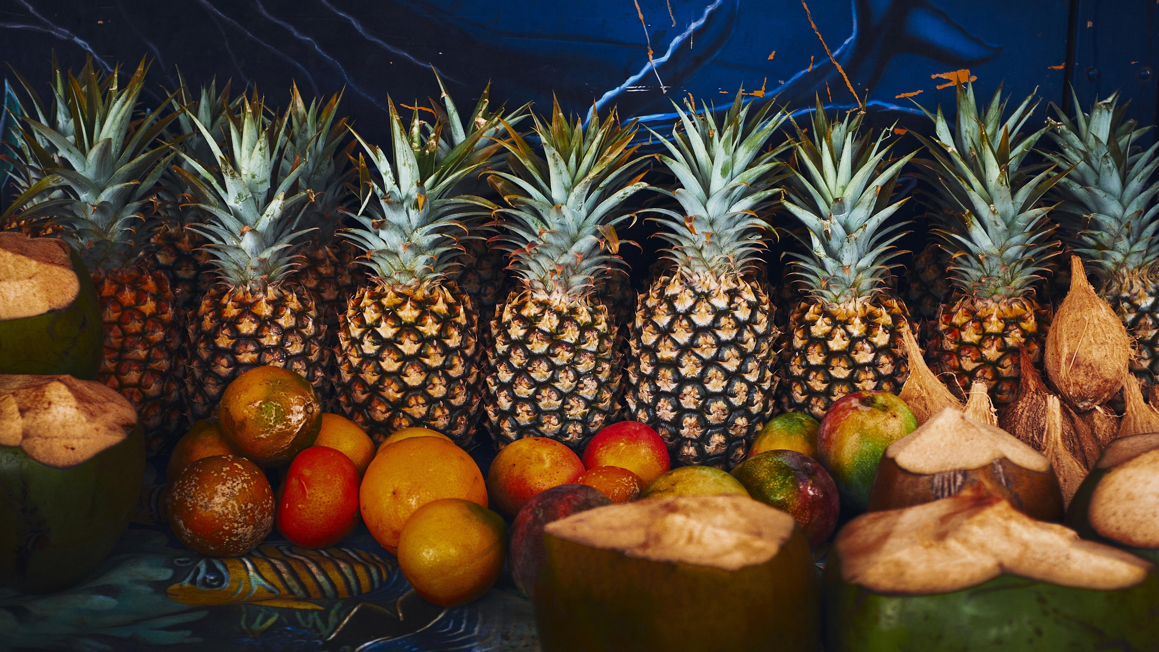 Download wallpaper 3840x2160 pineapple, fruit, coconuts 4k