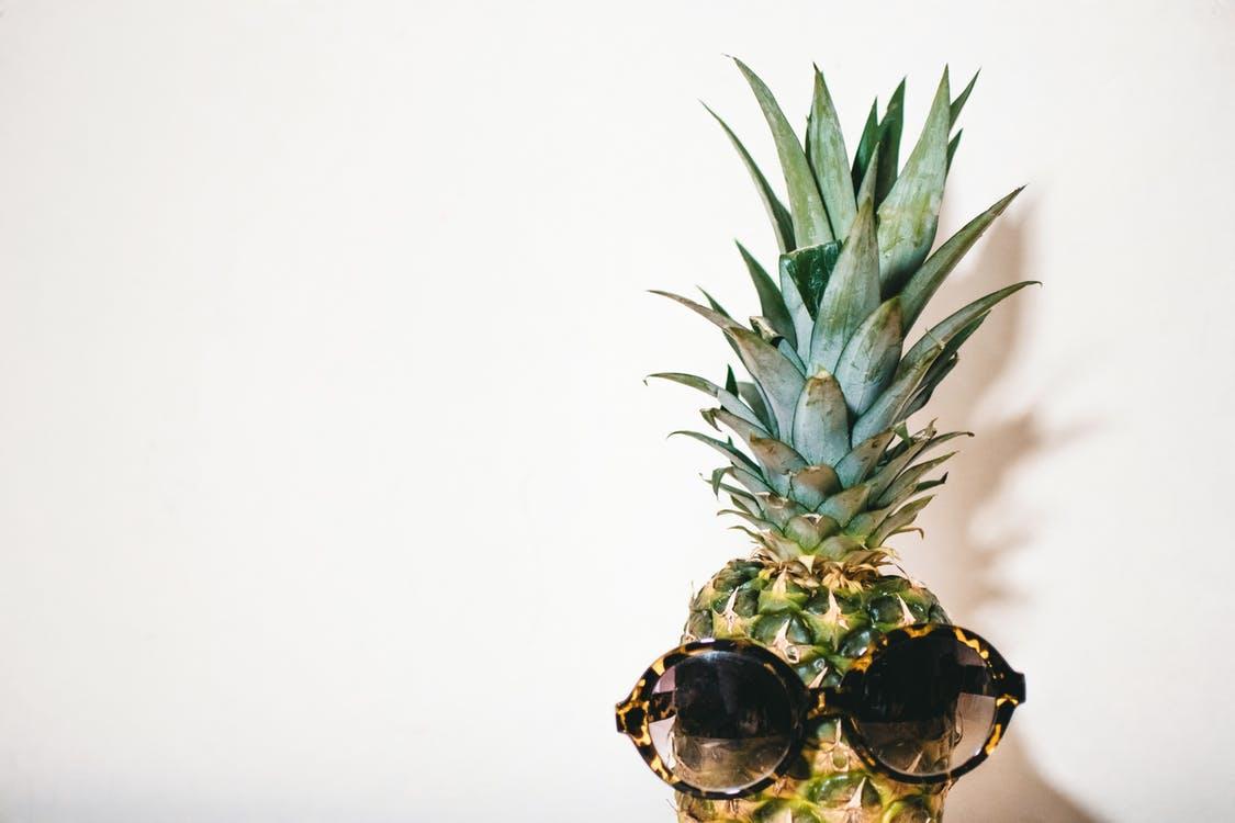 Close Up Photography Of Eyeglasses On Pineapple · Free Stock