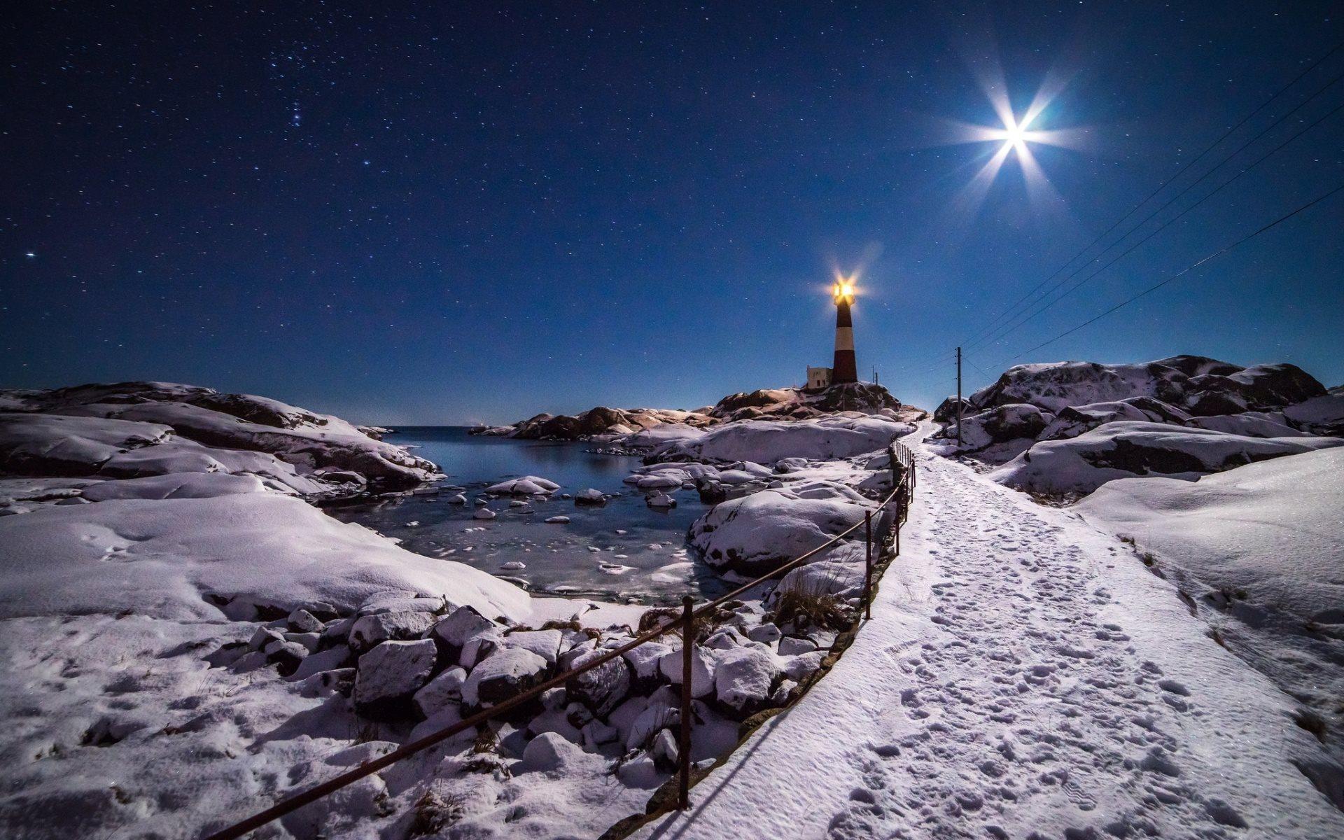 Download wallpaper lighthouse, snow, blue sky, winter