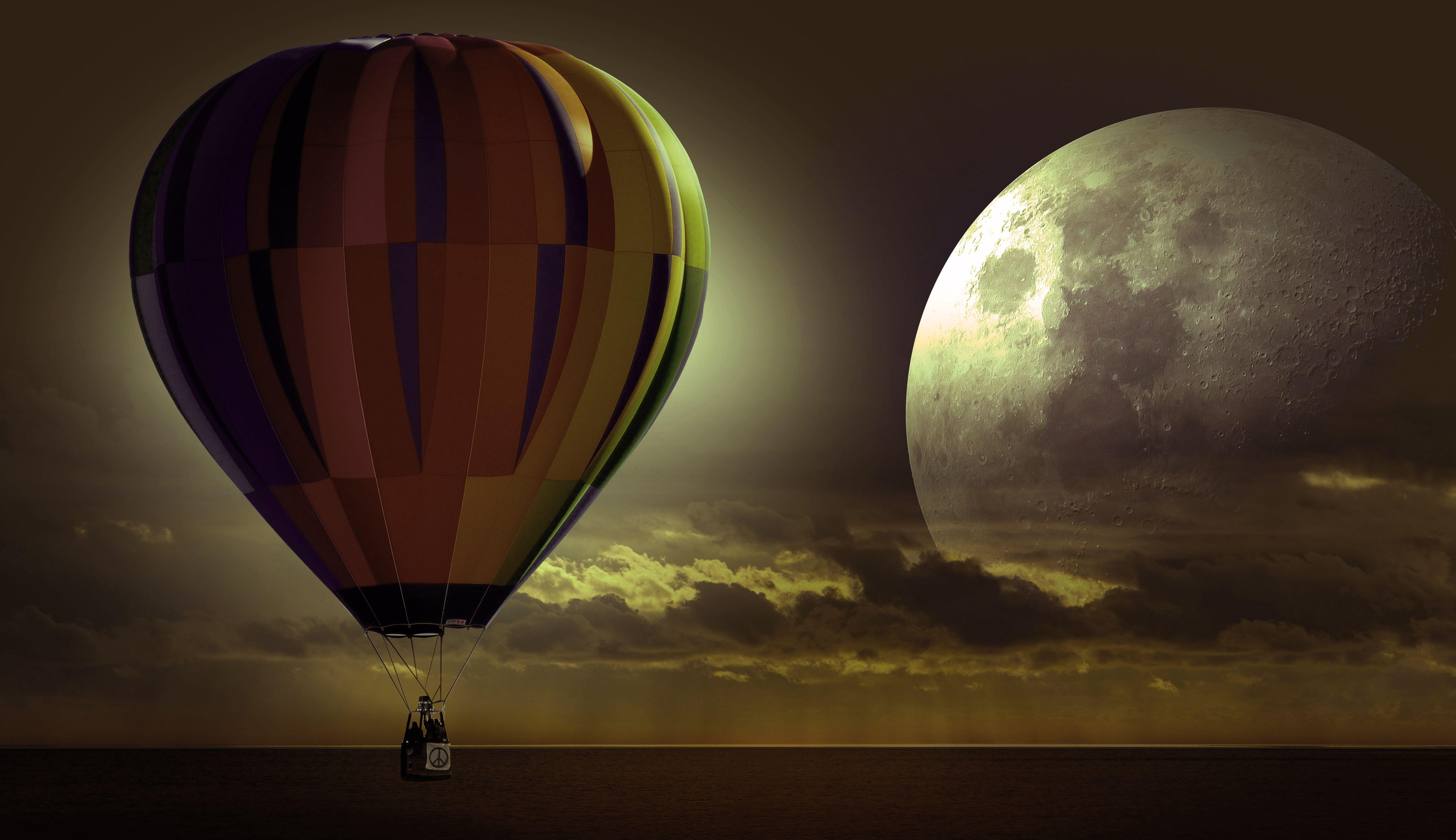 Hot Air Balloon In High At Sky With Full Moon. Awesome Image