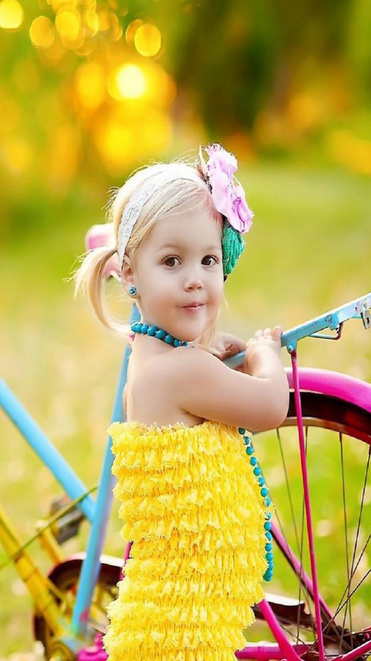 Cute Girl With Cycle In Park iPhone 20 Mobile Wallpaper