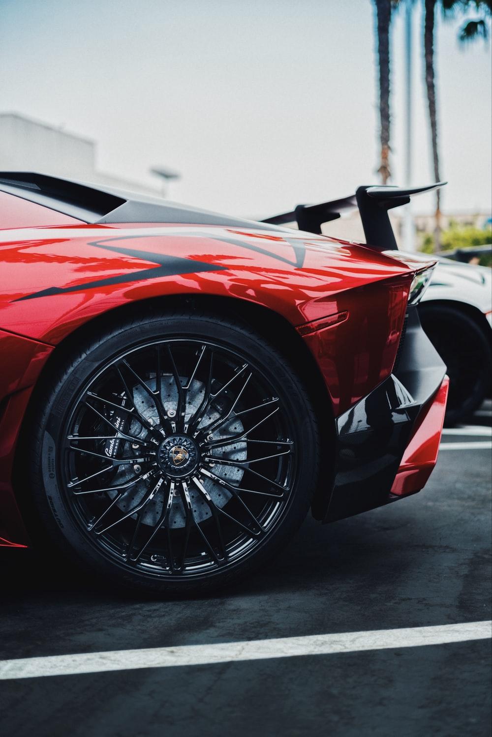black and red Lamborghini Aventador SV rear left side photo